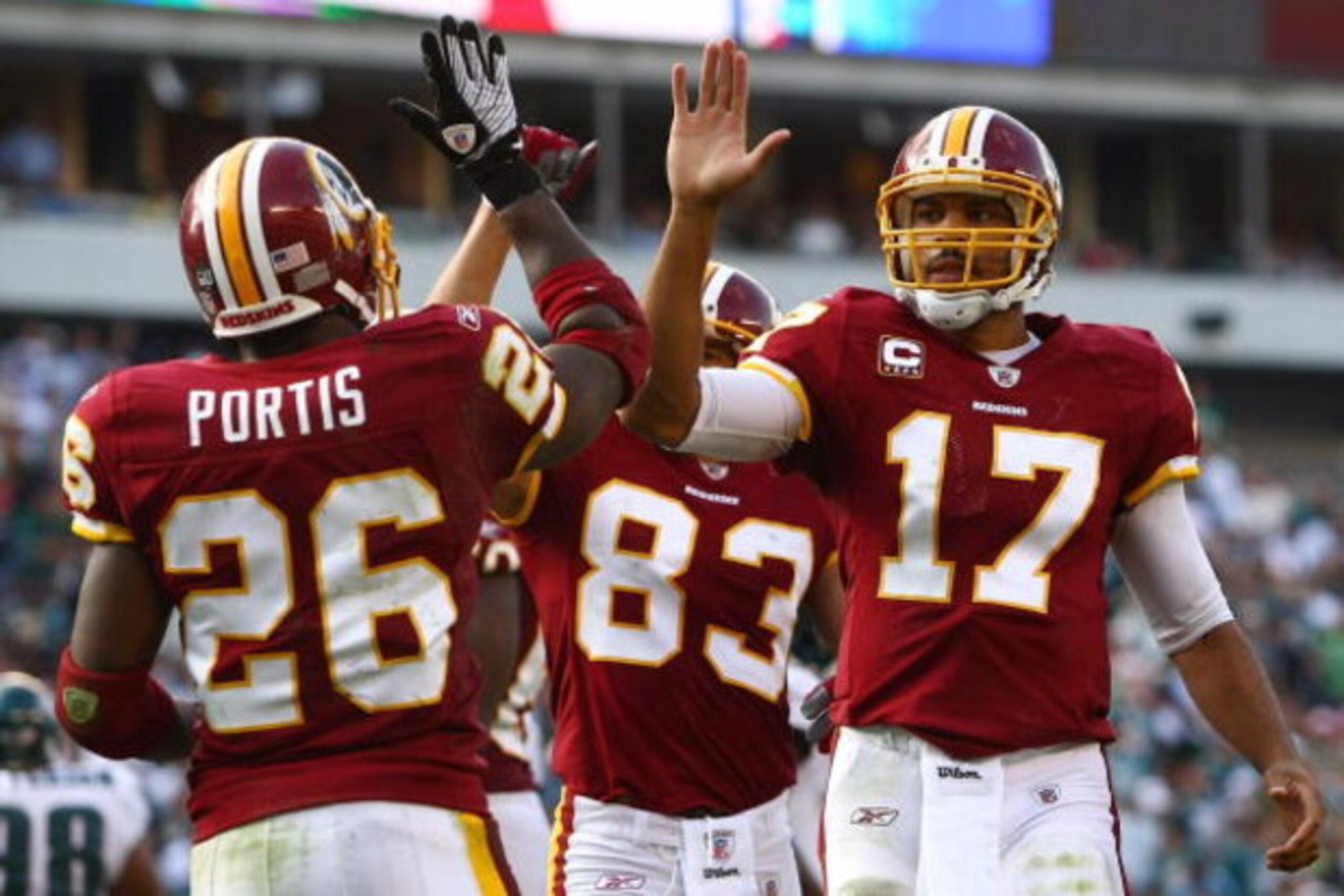 PHILADELPHIA - OCTOBER 05:  Jason Campbell #17 of the Washington Redskins congratulates teammate Clinton Portis #26 after his touchdown against the Philadelphia Eagles on October 5, 2008 at Lincoln Financial Field in Philadelphia, Pennsylvania.  (Photo by