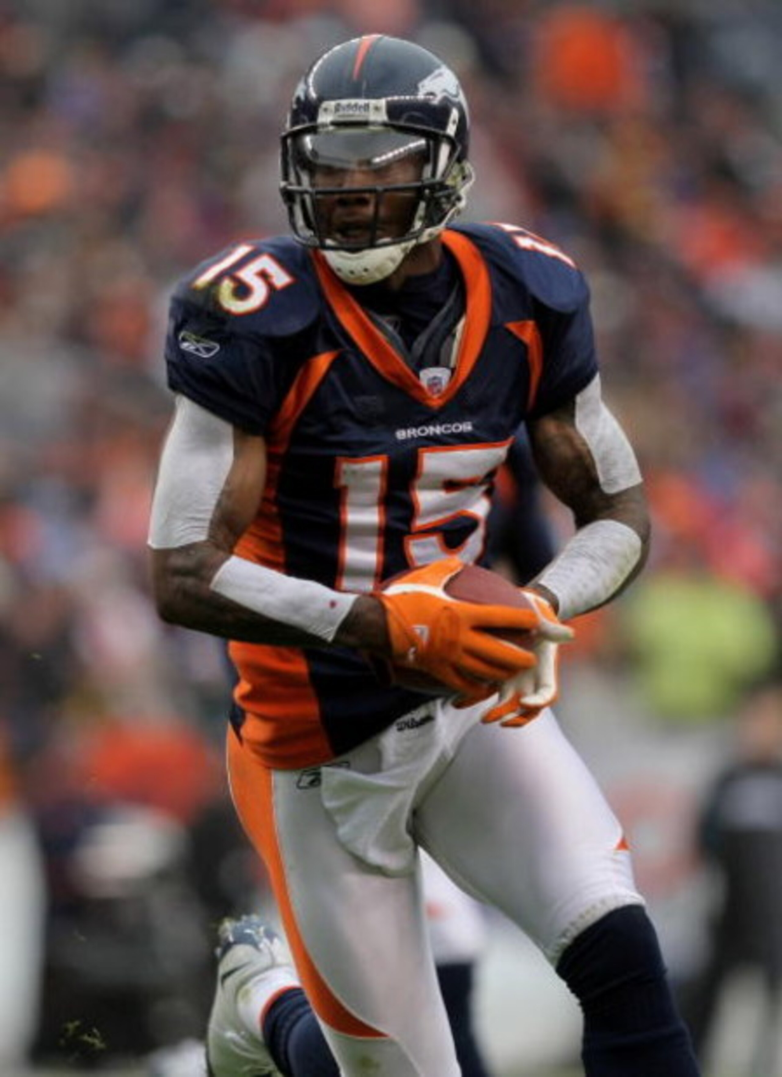 DENVER - OCTOBER 12:  Wide receiver Brandon Marshall #15 of the Denver Broncos makes a reception against the Jacksonville Jaguars during NFL action at Invesco Field at Mile High on October 12, 2008 in Denver, Colorado. The Jaguars defeated the Broncos 24-