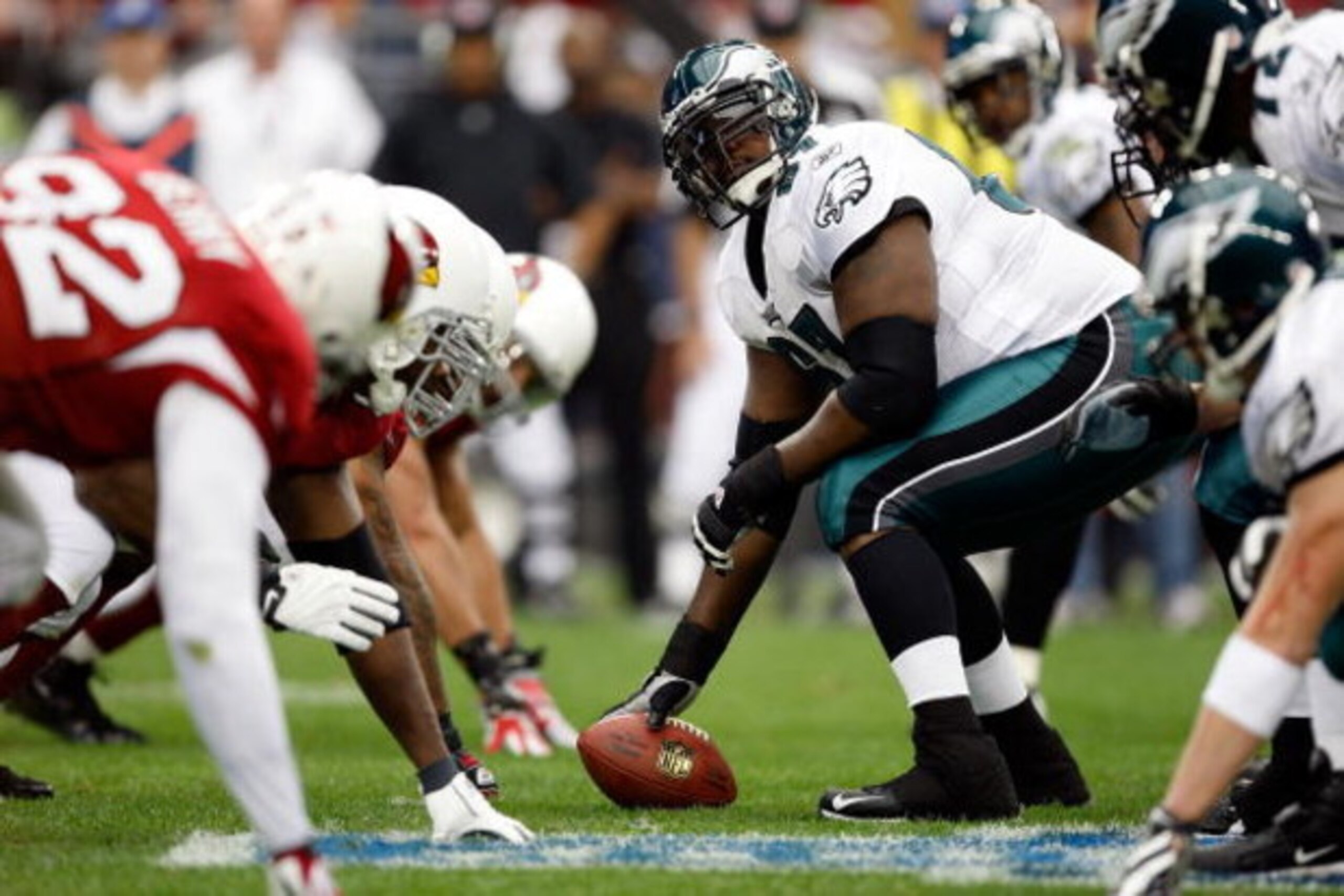GLENDALE, AZ - JANUARY 18:  Center Jamaal Jackson #67 of the Philadelphia Eagles looks over as he prepares to hike the ball during the NFC championship game against the Arizona Cardinals on January 18, 2009 at University of Phoenix Stadium in Glendale, Ar
