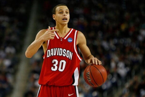 DETROIT - MARCH 30: Stephen Curry #30 of the Davidson Wildcats directs the offense against the Kansas Jayhawks during the Midwest Regional Final of the 2008 NCAA Division I Men's Basketball Tournament at Ford Field on March 30, 2008 in Detroit, Michigan. DETROIT - MARCH 30: Stephen Curry #30 of the Davidson Wildcats directs the offense against the Kansas Jayhawks during the Midwest Regional Final of the 2008 NCAA Division I Men's Basketball Tournament at Ford Field on March 30, 2008 in Detroit, Michigan.