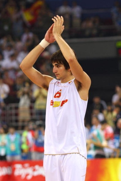 BEIJING - AUGUST 24: Ricky Rubio #6 of Spain reacts after the United States won 118-107 in the gold medal game during Day 16 of the Beijing 2008 Olympic Games at the Beijing Olympic Basketball Gymnasium on August 24, 2008 in Beijing, China. (Photo by Ph BEIJING - AUGUST 24: Ricky Rubio #6 of Spain reacts after the United States won 118-107 in the gold medal game during Day 16 of the Beijing 2008 Olympic Games at the Beijing Olympic Basketball Gymnasium on August 24, 2008 in Beijing, China. (Photo by Ph