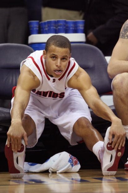 CHARLOTTE, NC - DECEMBER 6:  Stephen Curry #30 of the Davidson Wildcats stretches during the game against the North Carolina State Wolfpack at Time Warner Cable Arena on December 6, 2008 in Charlotte, North Carolina. (Photo by Streeter Lecka/Getty Images)