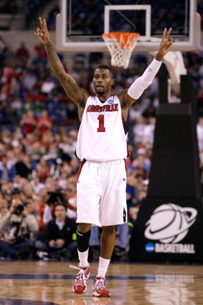 INDIANAPOLIS - MARCH 27:  Terrence Williams #1 of the Louisville Cardinals celebrates on court against the Arizona Wildcats during the third round of the NCAA Division I Men's Basketball Tournament at the Lucas Oil Stadium on March 27, 2009 in Indianapoli