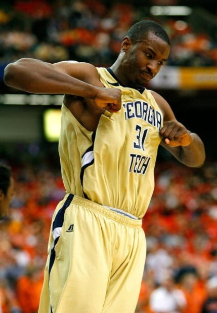 ATLANTA - MARCH 12:  Gani Lawal #31 of the Georgia Tech Yellow Jackets reacts after dunking against the Clemson Tigers during day one of the 2009 ACC Men's Basketball Tournament on March 12, 2009 at the Georgia Dome in Atlanta, Georgia.  (Photo by Kevin C