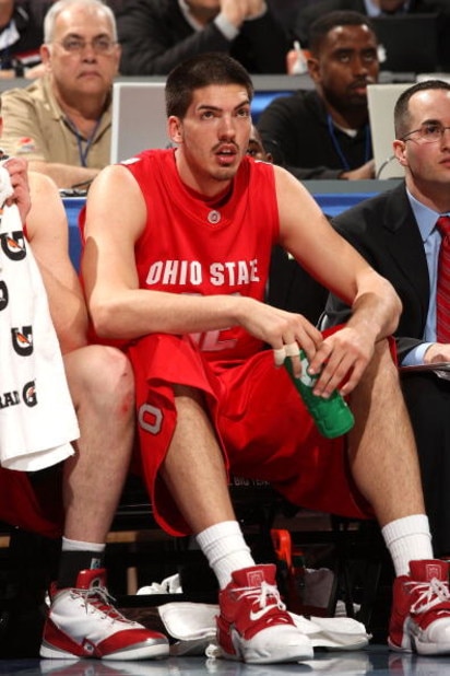 INDIANAPOLIS - MARCH 13:  B.J. Mullens #32 of the Ohio State Buckeyes looks on from the bench against the Wisconsin Badgers  during the second round of the Big Ten Men's Basketball Tournament at Conseco Fieldhouse on March 13, 2009 in Indianapolis, Indian