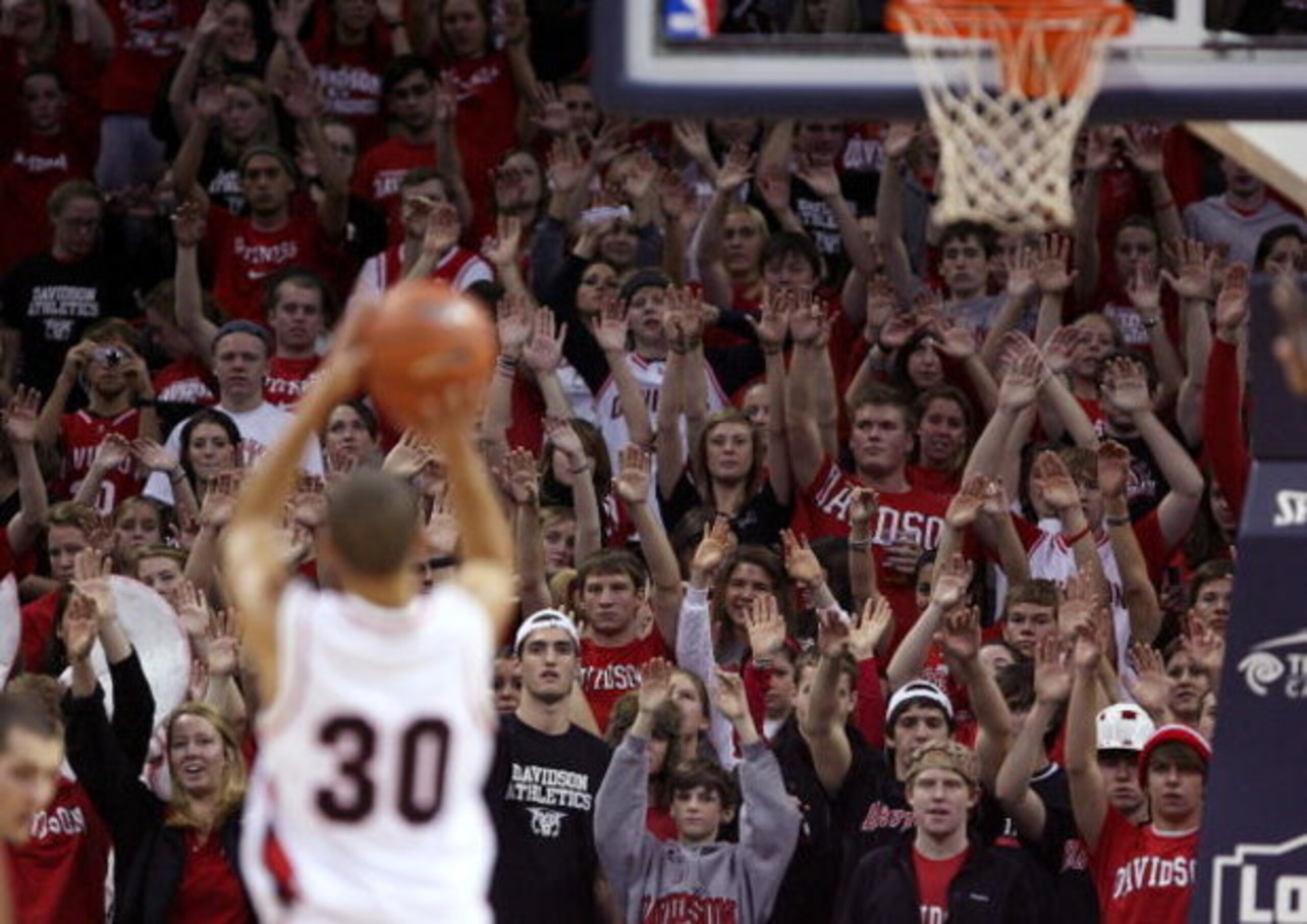 CHARLOTTE, NC - DECEMBER 06:  Stephen Curry #30 of the Davidson Wildcats shoots a free throw against the North Carolina State Wolfpack during their game at Time Warner Cable Arena on December 6, 2008 in Charlotte, North Carolina.  (Photo by Streeter Lecka