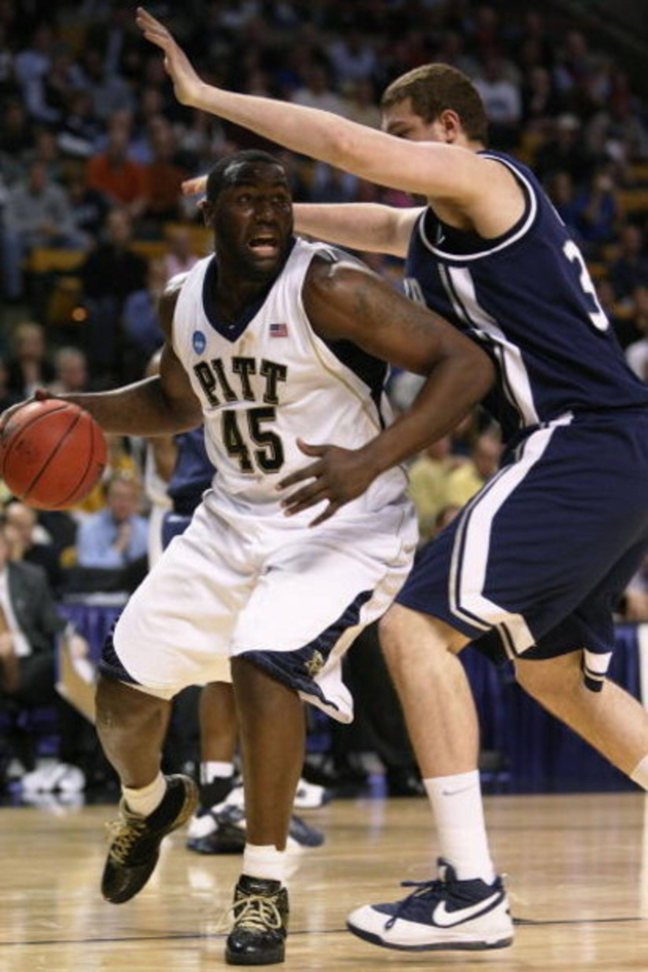 BOSTON - MARCH 26:  DeJuan Blair #45 of the Pittsburgh Panthers tries to drive past Kenny Frease #32 of the Xavier Musketeers during the NCAA Men's Basketball Tournament East Regionals at TD Banknorth Garden on March 26, 2009 in Boston, Massachusetts.  (P