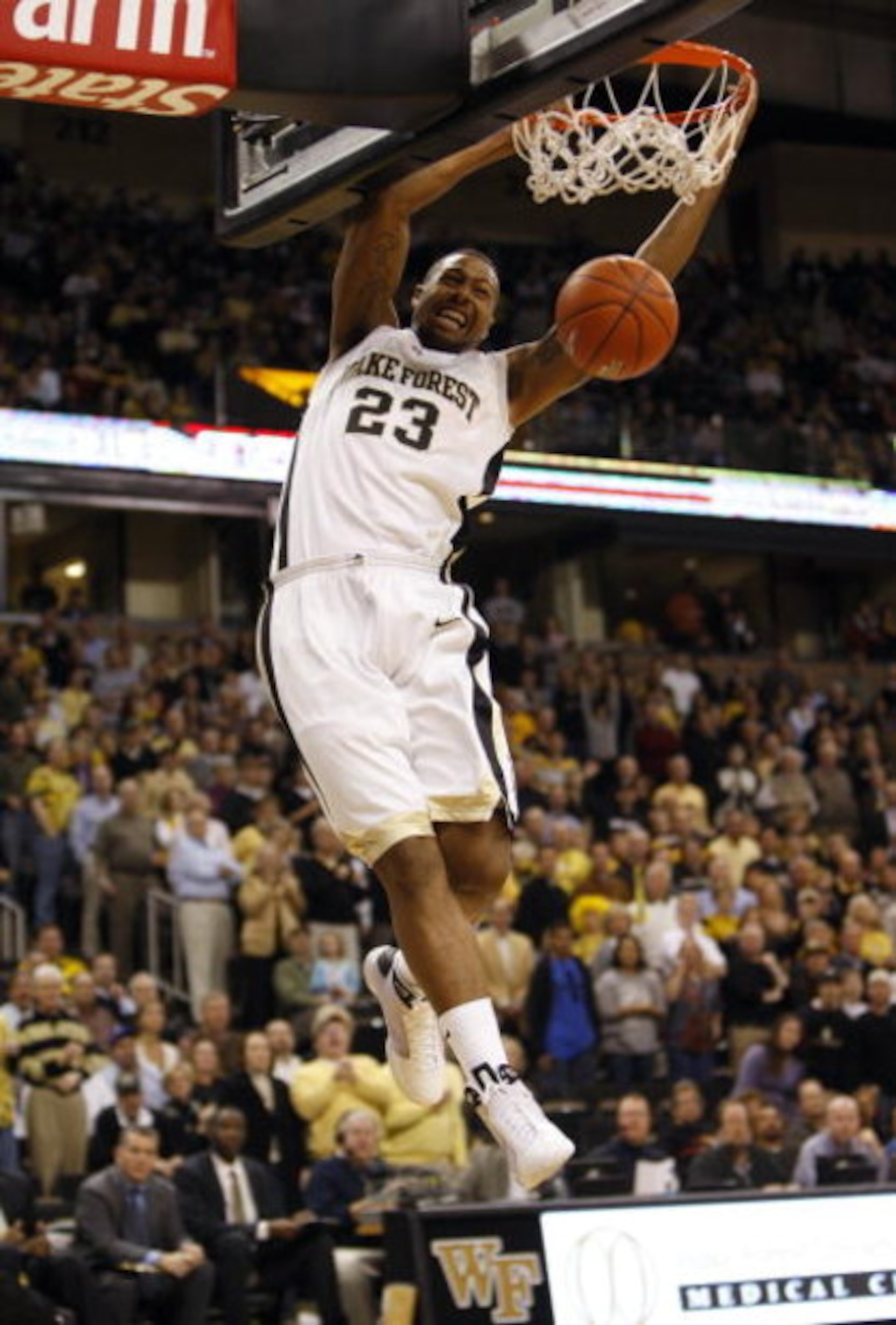 WINSTON-SALEM, NC - FEBRUARY 18:  James Johnson #23 of the Wake Forest Demon Deacons goes up for the slam dunk during their game against the Georgia Tech Yellow Jackets at Lawrence Joel Coliseum on February 18, 2009 in Winston-Salem, North Carolina. The D