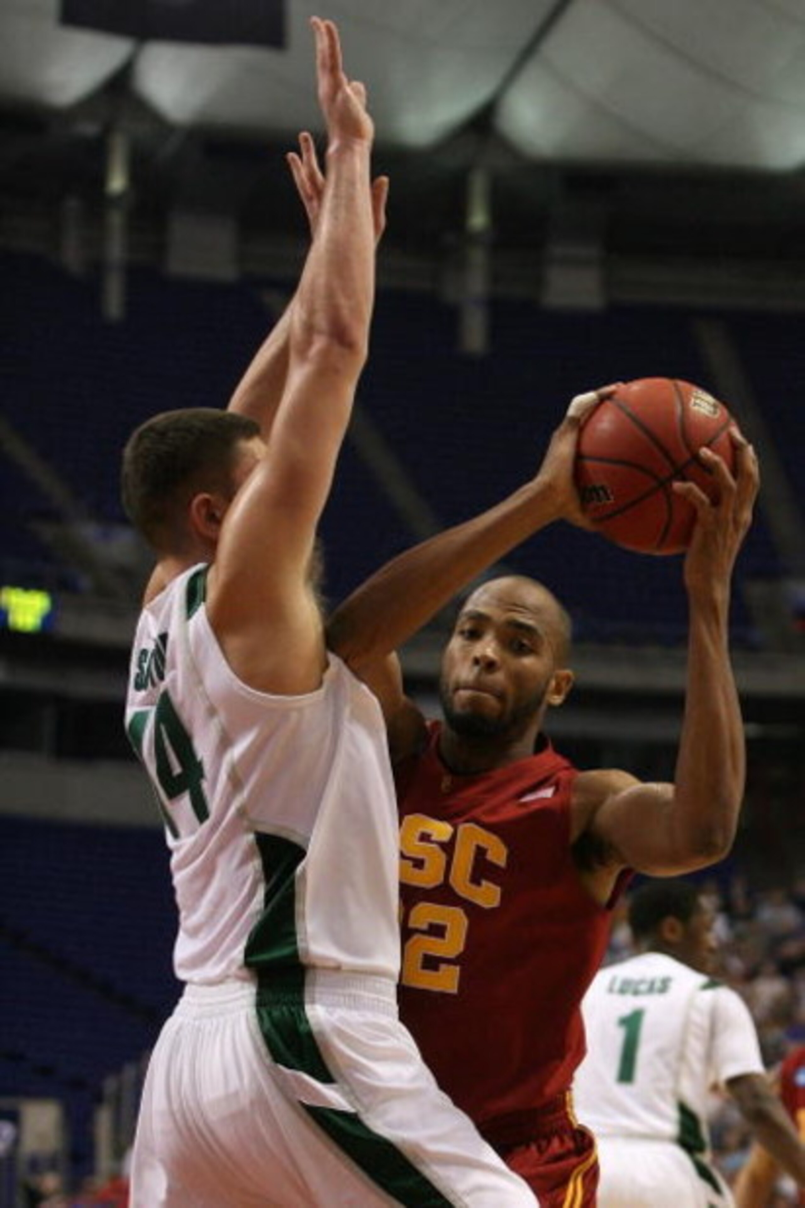MINNEAPOLIS - MARCH 22:  Taj Gibson #22 of the USC Trojans drives against Goran Sutopn #14 of the Michigan State Spartans during the second round of the NCAA Division I Men's Basketball Tournament at the Hubert H. Humphrey Metrodome on March 22, 2009 in M