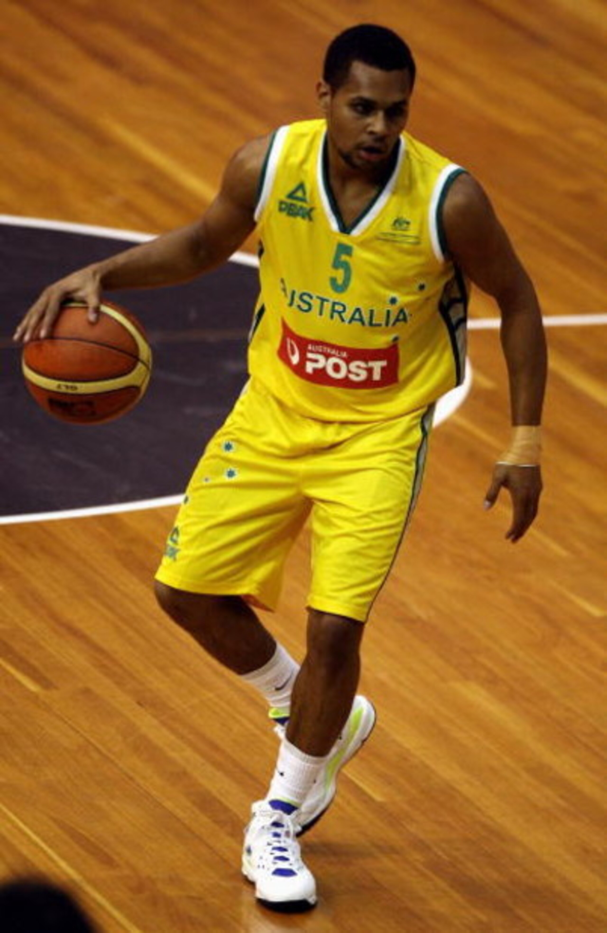 MELBOURNE, AUSTRALIA - JUNE 20:  Pat Mills of the Boomers dribbles the ball during the World Challenge 2008 match between Australia and Iran at the State Netball and Hockey Centre on June 20, 2008 in Melbourne, Australia.  (Photo by Quinn Rooney/Getty Ima