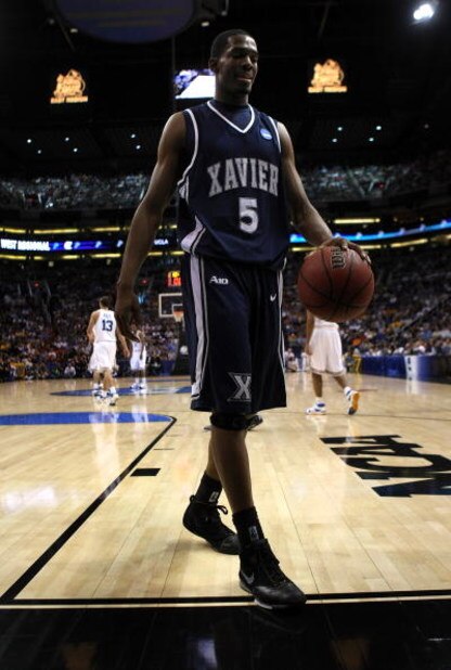 PHOENIX - MARCH 29:  Derrick Brown #5 of the Xavier Musketeers walks on the court against the UCLA Bruins during the first half of the West Regional Final at the U.S. Airways Center on March 29, 2008 in Phoenix, Arizona.  (Photo by Stephen Dunn/Getty Imag