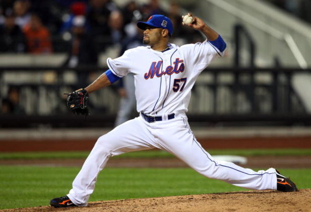 NEW YORK - MAY 11:  Johan Santana #57 of the New York Mets pitches against the Atlanta Braves on May 11, 2009 at Citi Field in the Flushing neighborhood of the Queens borough of New York City. The Braves defeated the Mets 8-3.  (Photo by Jim McIsaac/Getty