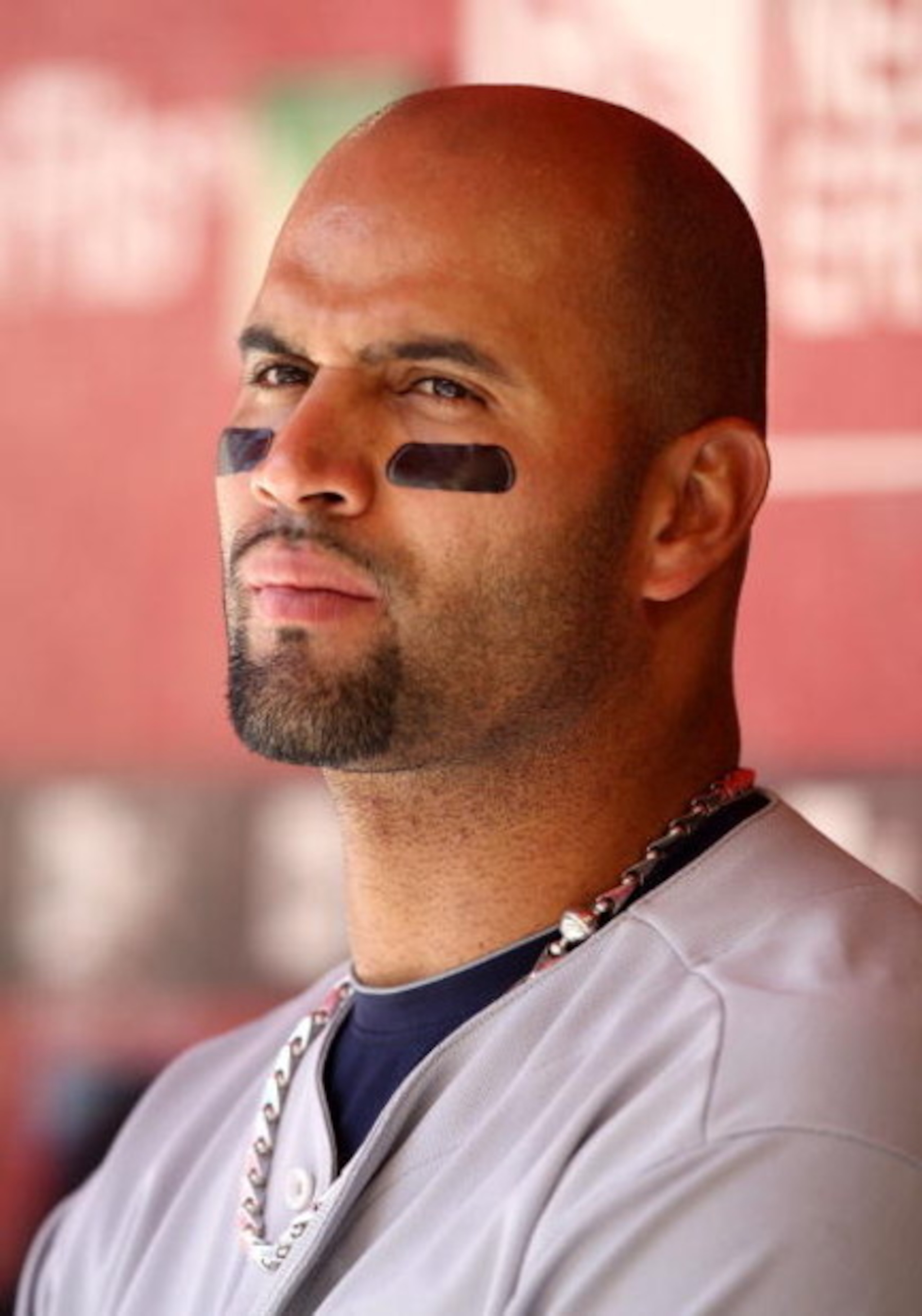 PHOENIX - APRIL 15:  Albert Pujols #5 of the St. Louis Cardinals bats looks on from the dugout during the game against the Arizona Diamondbacks at Chase Field on April 15, 2009 in Phoenix, Arizona. The Cardinals defeated the Diamondbacks 12-7.  (Photo by 