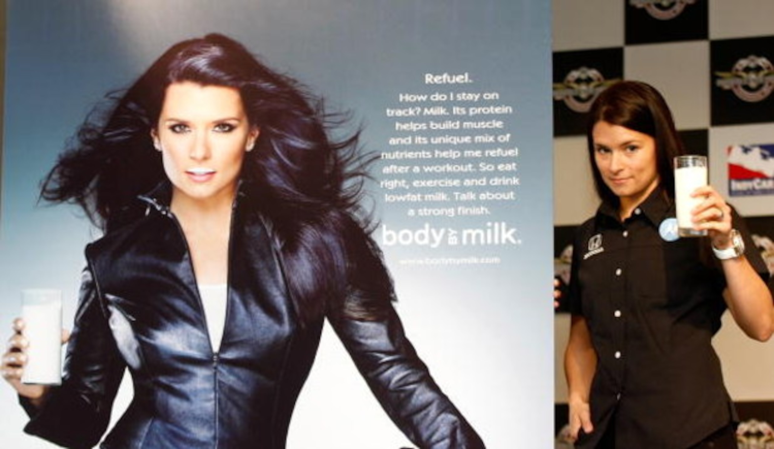 INDIANAPOLIS - MAY 07:  Danica Patrick driver of the #7 Motorola Andretti Green Racing Dallara Honda poses with some milk beside her new 'Got Milk?' ad campaign poster before practice for the IRL IndyCar Series 93rd running of the Indianapolis 500 on May 