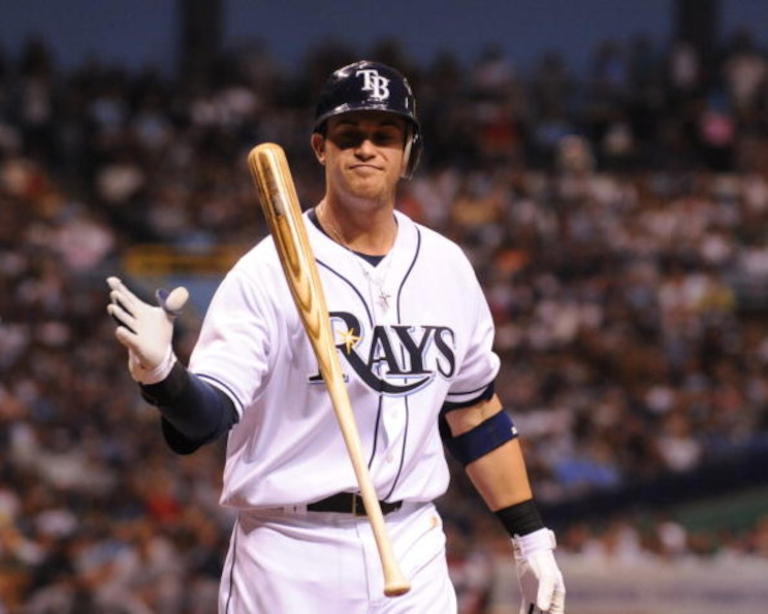 ST. PETERSBURG, FL - APRIL 13: Infielder Evan Longoria #3 of the  Tampa Bay Rays tosses a bat after a strikeout against the New York Yankees April 13, 2009 in St. Petersburg, Florida.  (Photo by Al Messerschmidt/Getty Images)