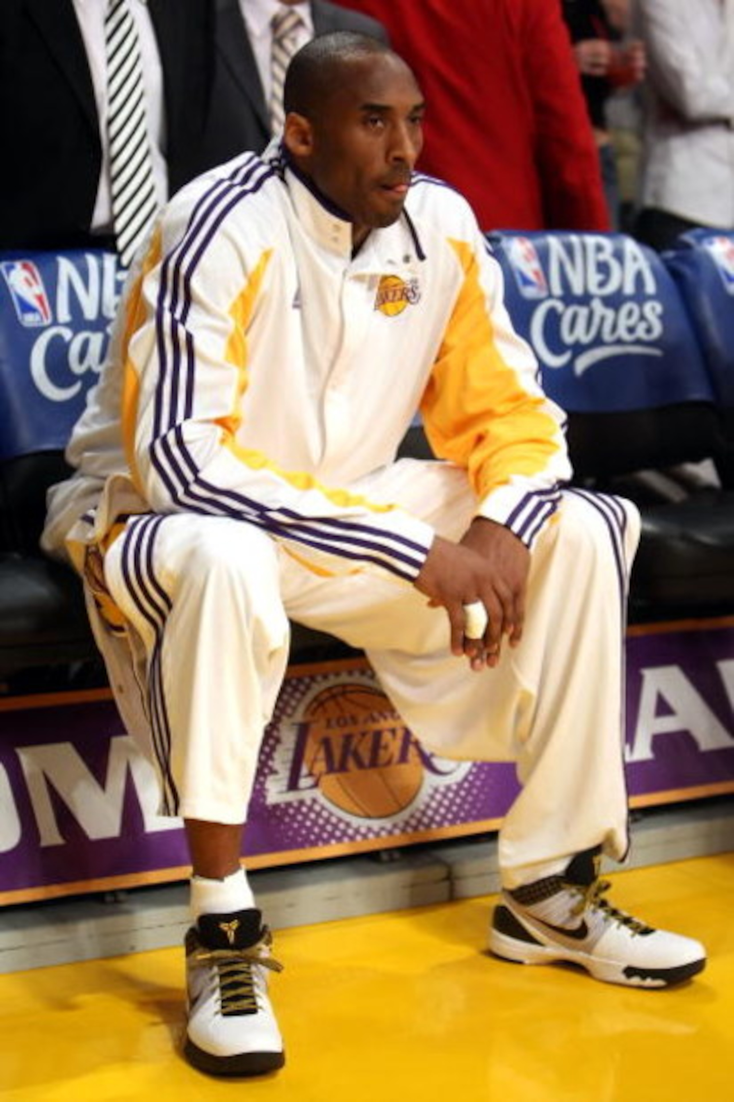 LOS ANGELES, CA - MAY 17:  Kobe Bryant #24 of the Los Angeles Lakers looks on from the bench before taking on the Houston Rockets in Game Seven of the Western Conference Semifinals during the 2009 NBA Playoffs at Staples Center on May 17, 2009 in Los Ange