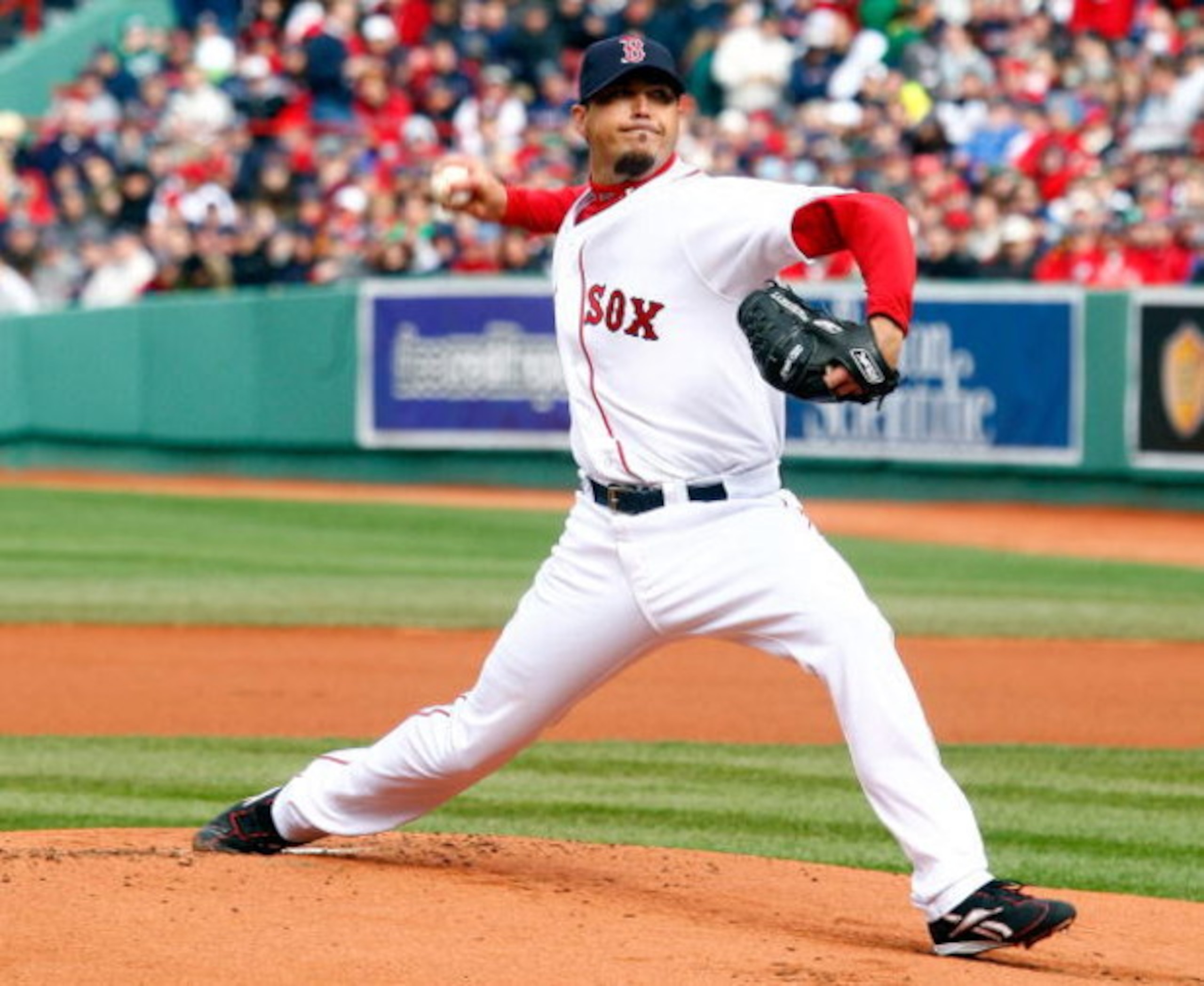 BOSTON - APRIL 7: Red Sox pitcher Josh Beckett #19 throws against the Tampa Bay Rays during an opening day game at Fenway Park April 7, 2009 in Boston, Massachusetts. (Photo by Jim Rogash/Getty Images)