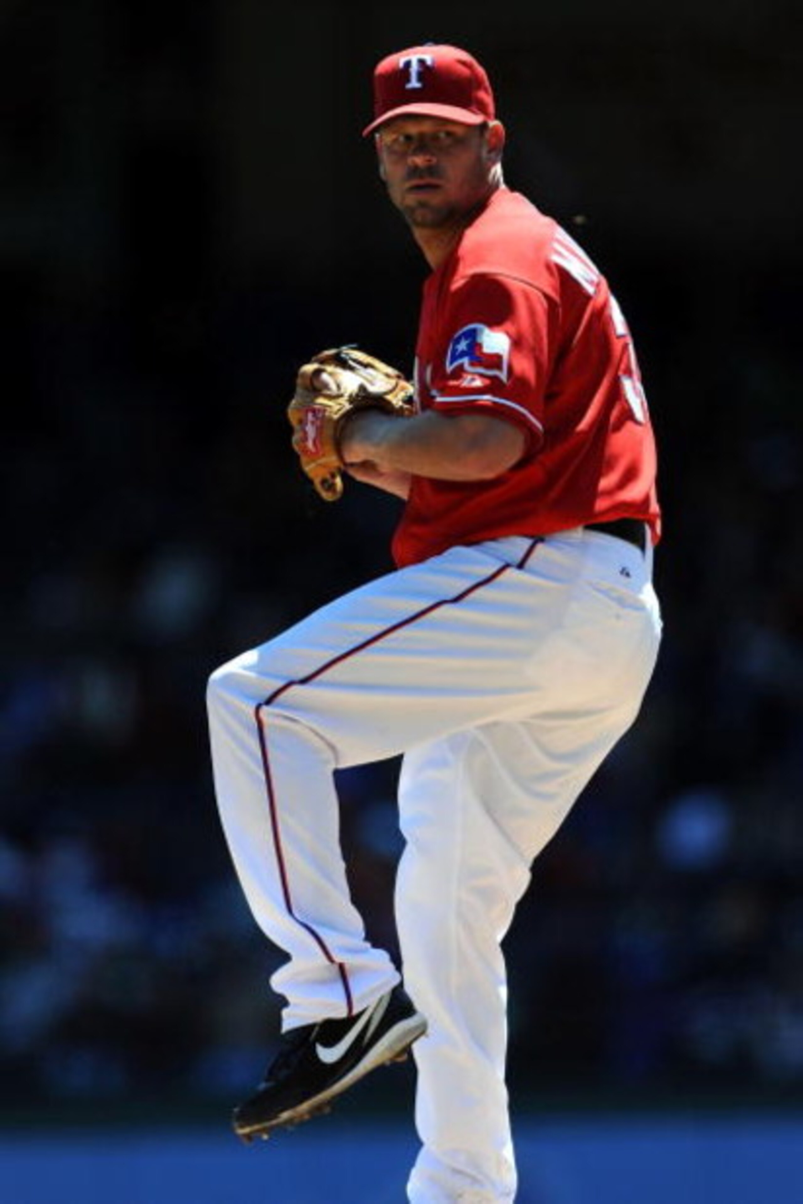ARLINGTON, TX - APRIL 6:  Pitcher Kevin Millwood #33 of the Texas Rangers throws against the Cleveland Indians during the home opener at Rangers Ballpark April 6, 2009 in Arlington, Texas.  (Photo by Ronald Martinez/Getty Images)