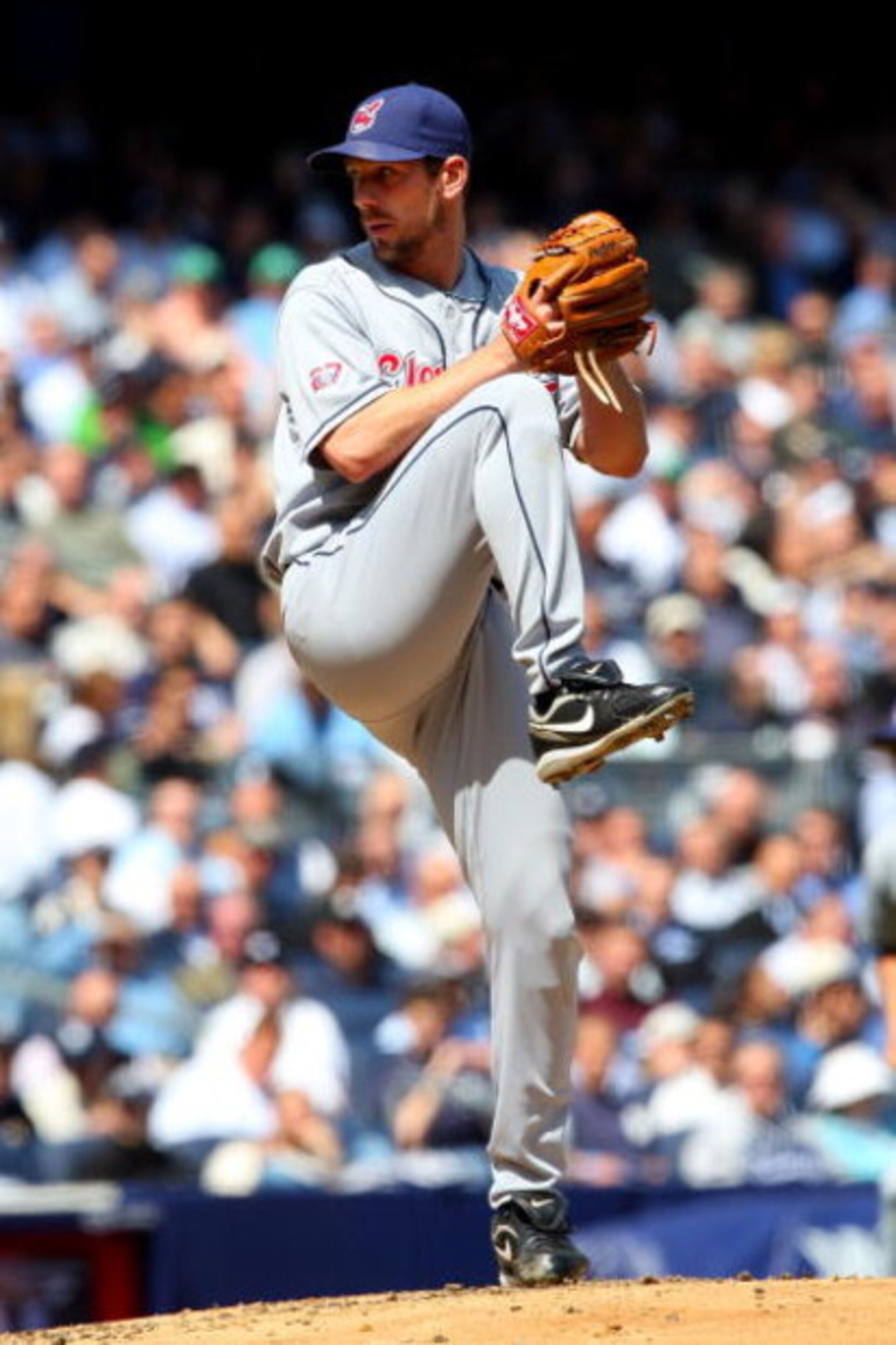 NEW YORK - APRIL 16:  Cliff Lee #31 of the Cleveland Indians pitches against the New York Yankees during opening day at the new Yankee Stadium on April 16, 2009 in the Bronx borough of New York City. This is the first regular season MLB game being played 
