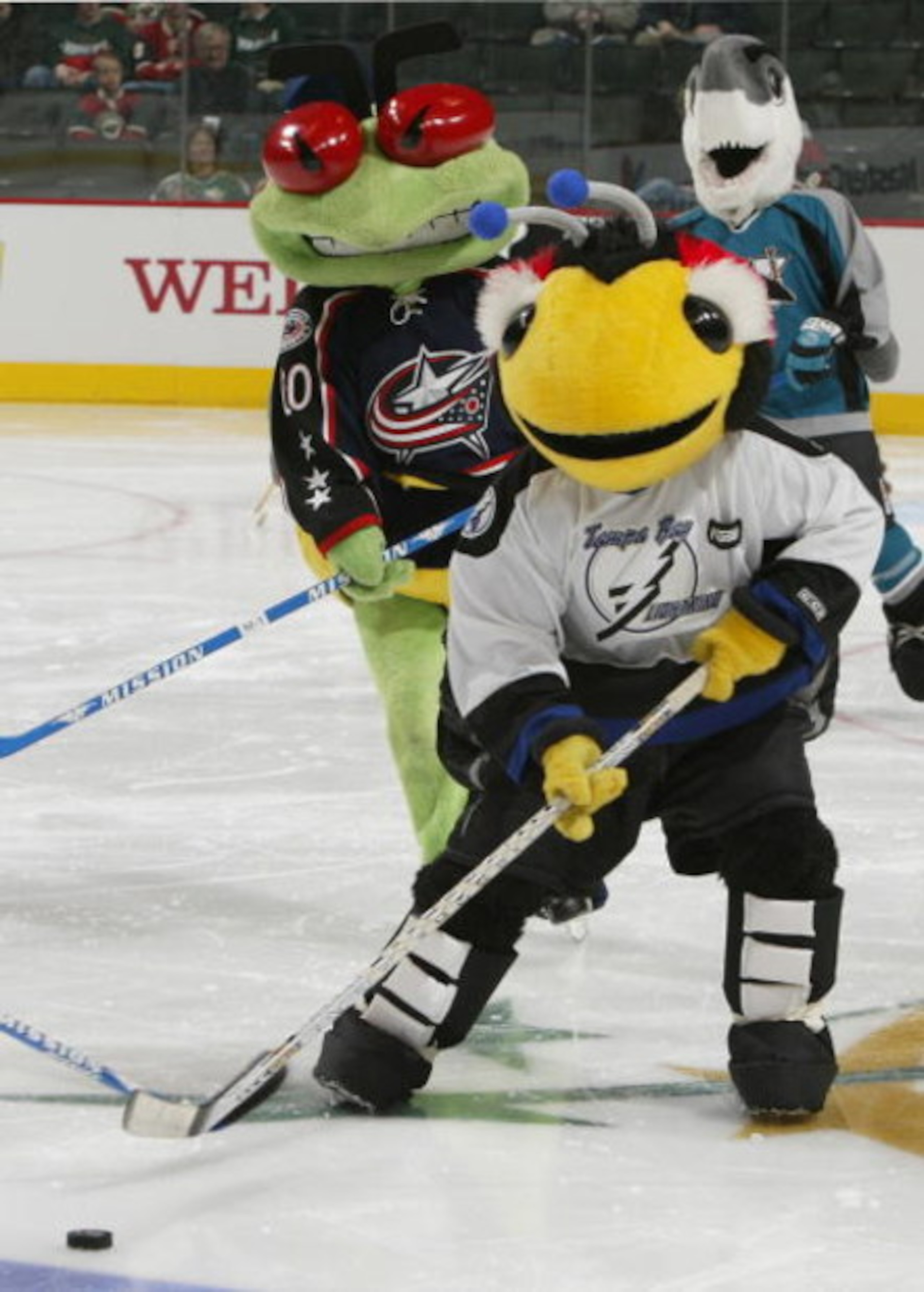 ST. PAUL, MN - FEBRUARY 7:  Tampa Lightning 'ThunderBug' competes with Columbus Blue Jacket 'Stinger' during the NHL Mascot game before the 54th NHL All-Star game on February 7, 2004 at the Xcel Energy Center in St. Paul, Minnesota. (Photo by Dave Sandfor