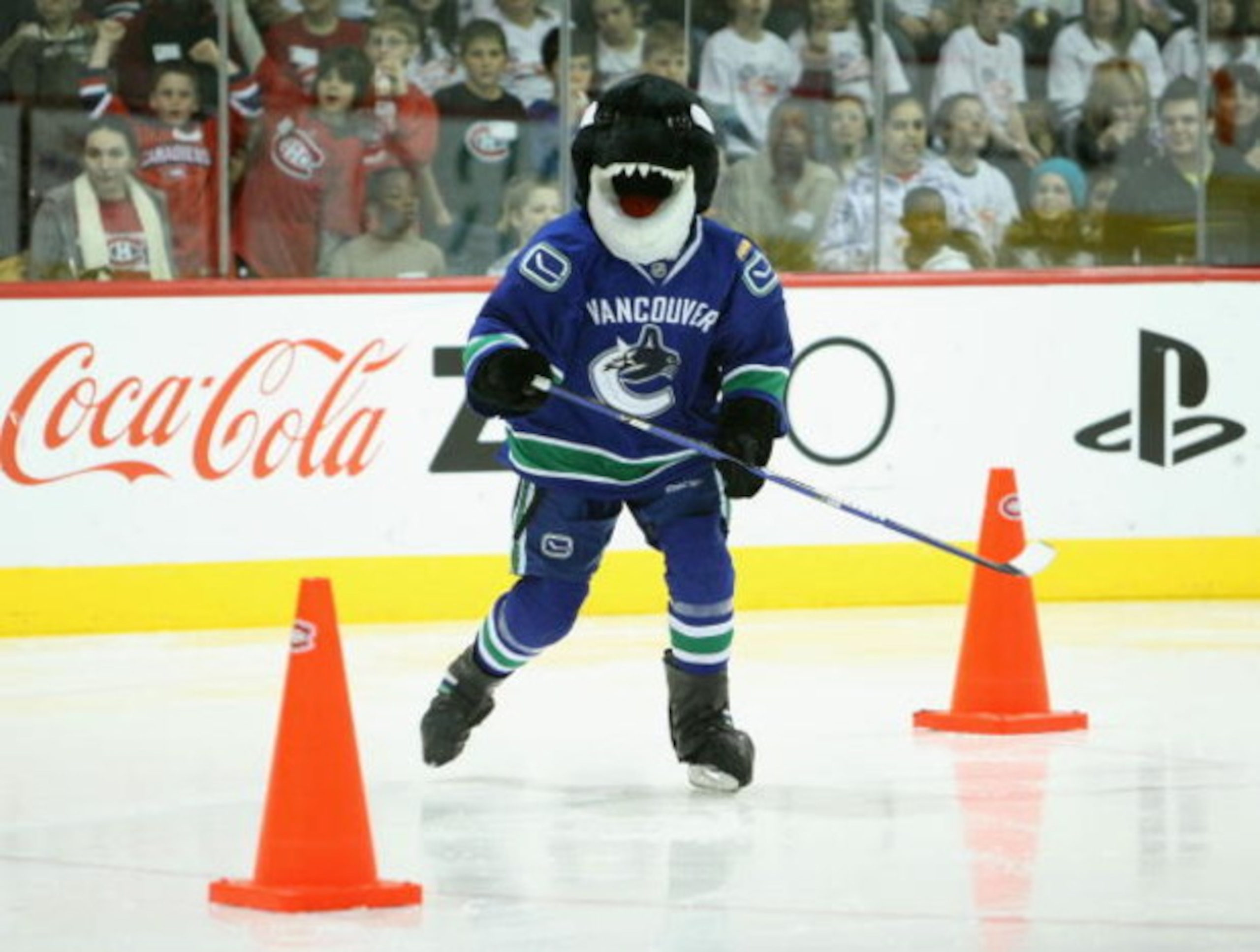 MONTREAL - JANUARY 25:  Vancouver Canucks mascot, Fin the Whale performs on the ice during the NHL All Star Mascot Breakfast at the Bell Centre Sports Complex on January 25, 2009 in Montreal, Canada.  (Photo by Nick Laham/Getty Images)