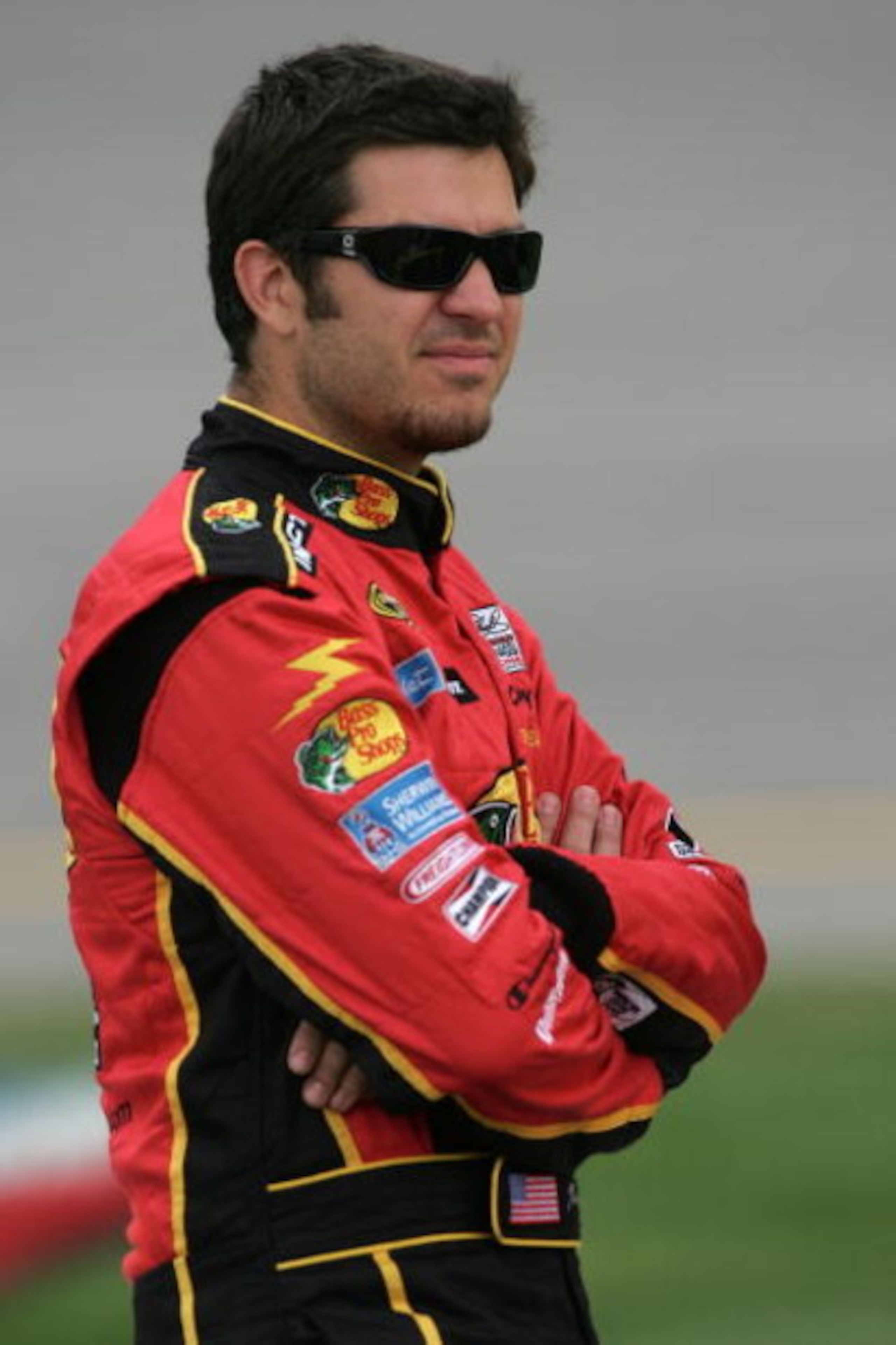 RICHMOND, VA - MAY 01:  Martin Truex Jr., driver of the #01 Bass Pro Shops/Tracker Boats Chevrolet, waits during qualifying for the NASCAR Sprint Cup Series Crown Royal Presents the Russ Friedman 400 at Richmond International Raceway on May 1, 2009 in Ric