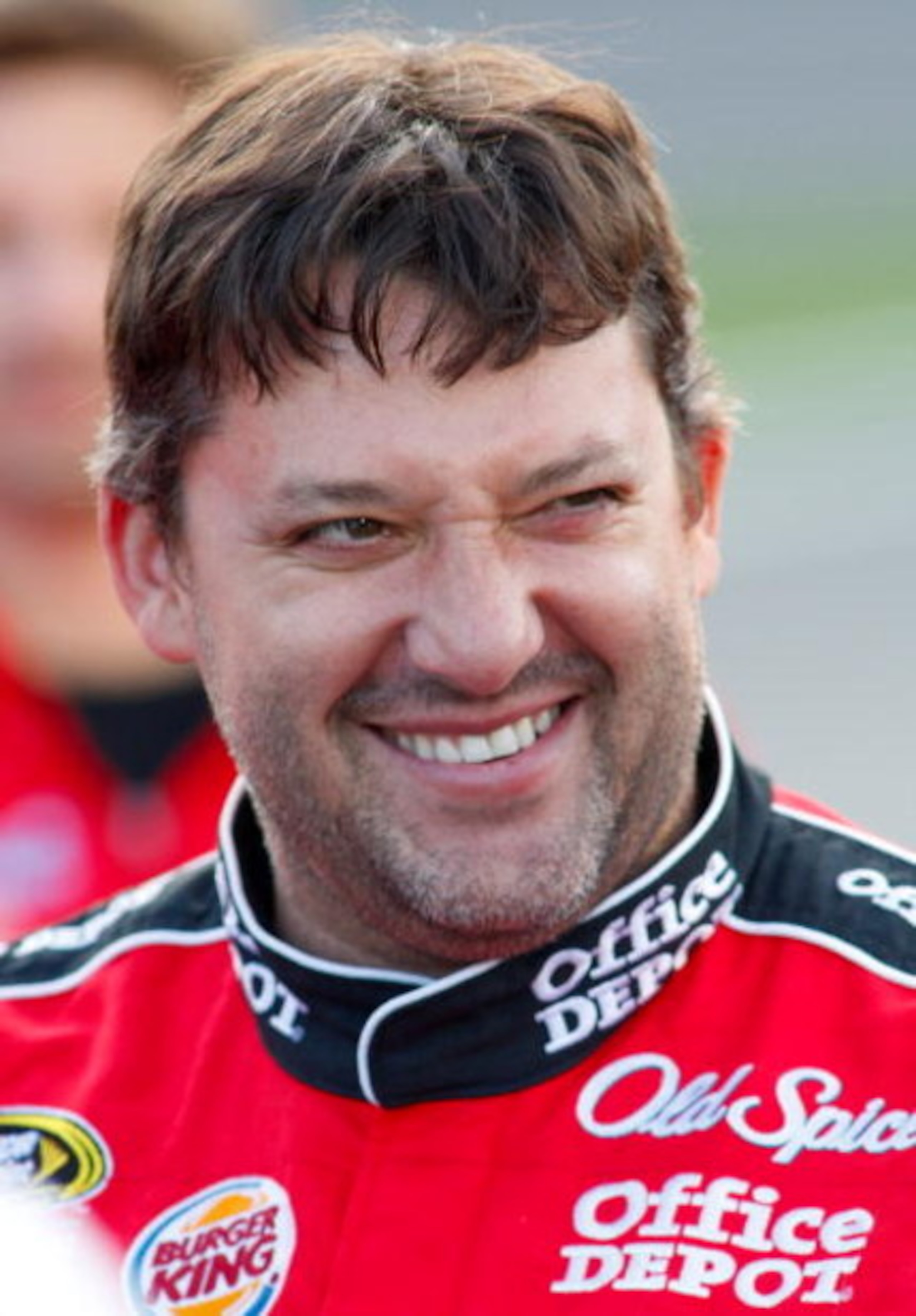 CONCORD, NC - MAY 21: Tony Stewart, driver of the #14 Office Depot Chevrolet, smiles during qualifying for the NASCAR Sprint Cup Series Coca-Cola 600 on May 21, 2009 at Lowe's Motor Speedway in Concord, North Carolina.  (Photo by Geoff Burke/Getty Images 