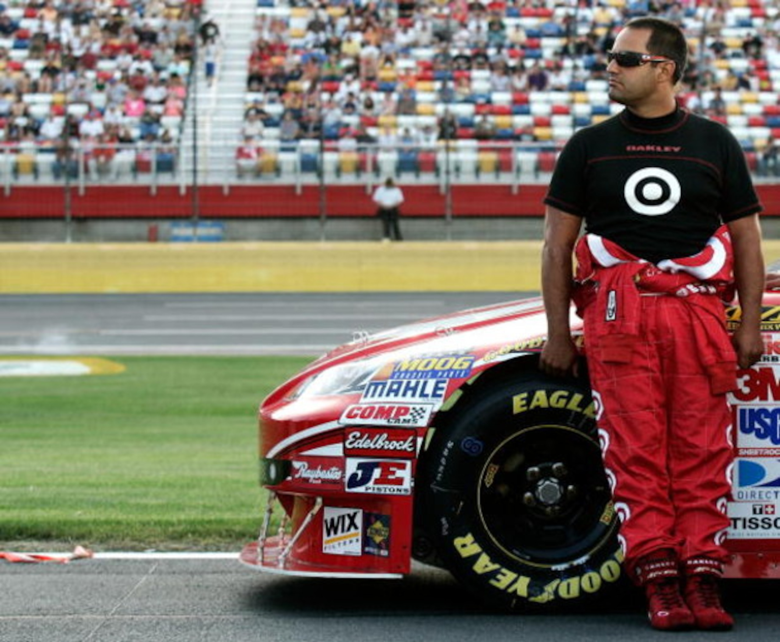 CONCORD, NC - MAY 21:  Juan Pablo Montoya stands next to the #42 Target Chevrolet on the grid during qualifying for the NASCAR Sprint Cup Series Coca-Cola 600 on May 21, 2009 at Lowe's Motor Speedway in Concord, North Carolina.  (Photo by Jason Smith/Gett