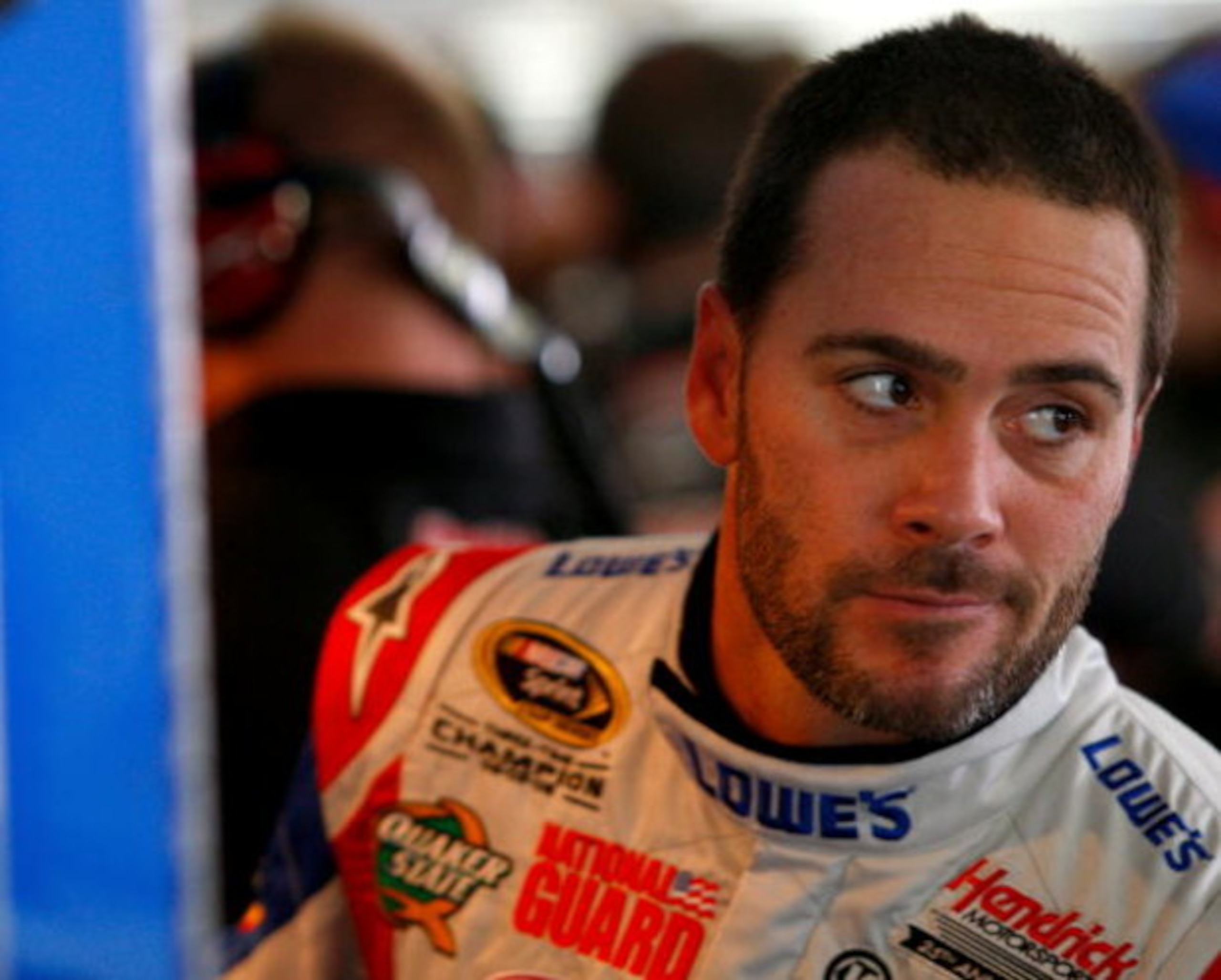 CONCORD, NC - MAY 21: Jimmie Johnson, driver of the #48 Lowe's Chevrolet, prepares to climb into his car during practice for the NASCAR Sprint Cup Series Coca-Cola 600 on May 21, 2009 at Lowe's Motor Speedway in Concord, North Carolina.  (Photo by Geoff B
