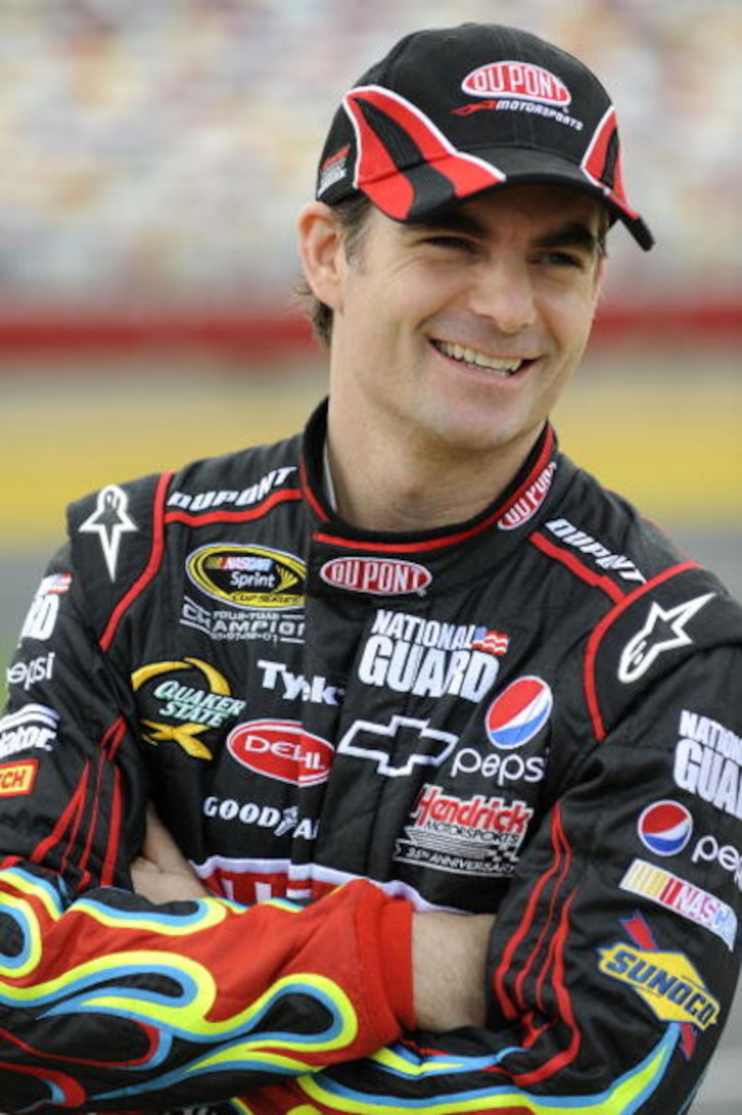 CONCORD, NC - MAY 15:  Jeff Gordon driver of the #24 DuPont Chevrolet stands on pit road during qualifying for the NASCAR Sprint All-Star Race on May 15, 2009 at Lowe's Motor Speedway in Concord, North Carolina.  (Photo by John Harrelson/Getty Images)