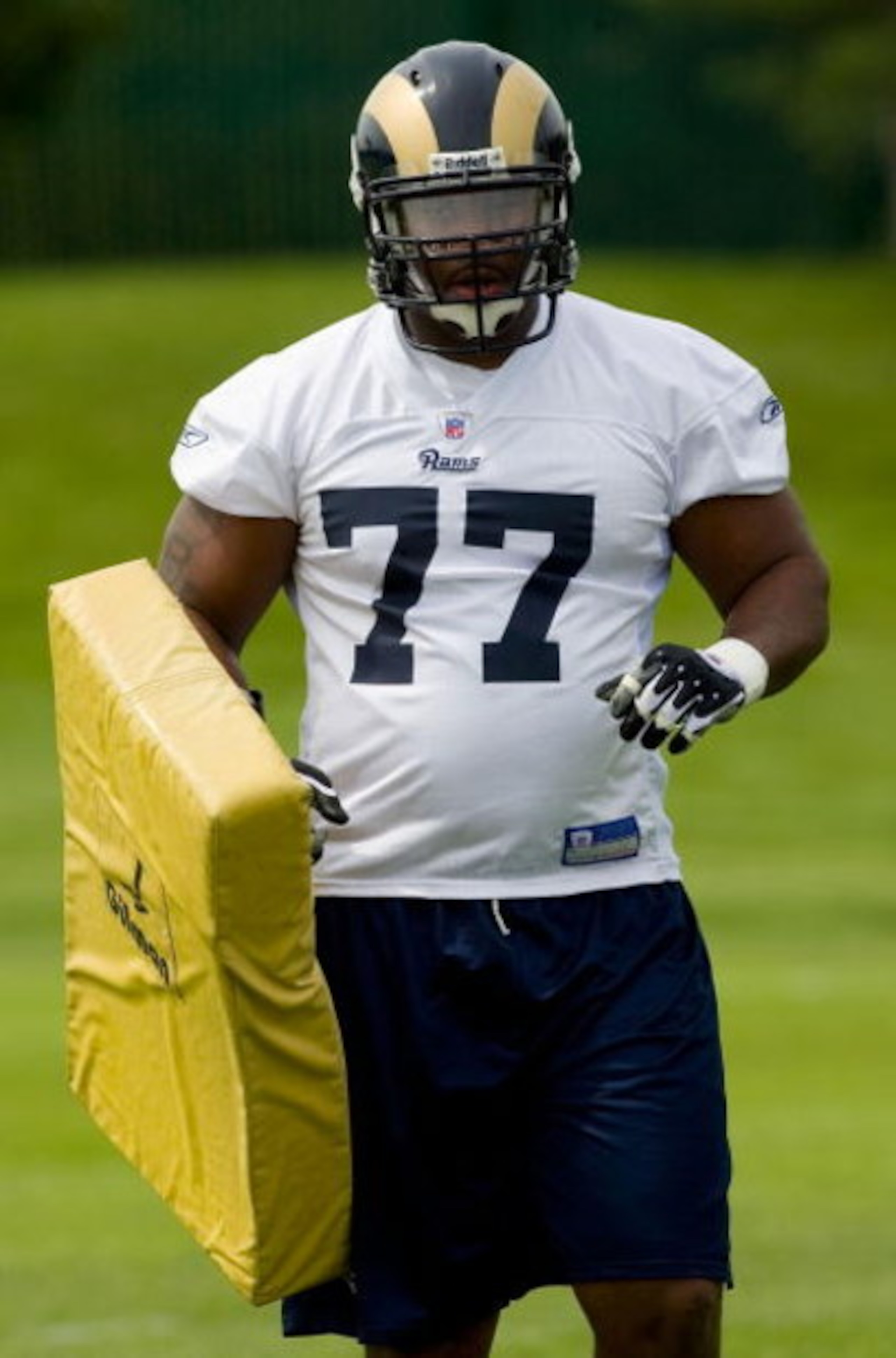 EARTH CITY, MO - MAY 2: Jason Smith #77 of the St. Louis Rams looks on during a mini camp on May 2, 2009 at the Russell Training Center in Earth City, Missouri.  (Dilip Vishwanat/Getty Images)