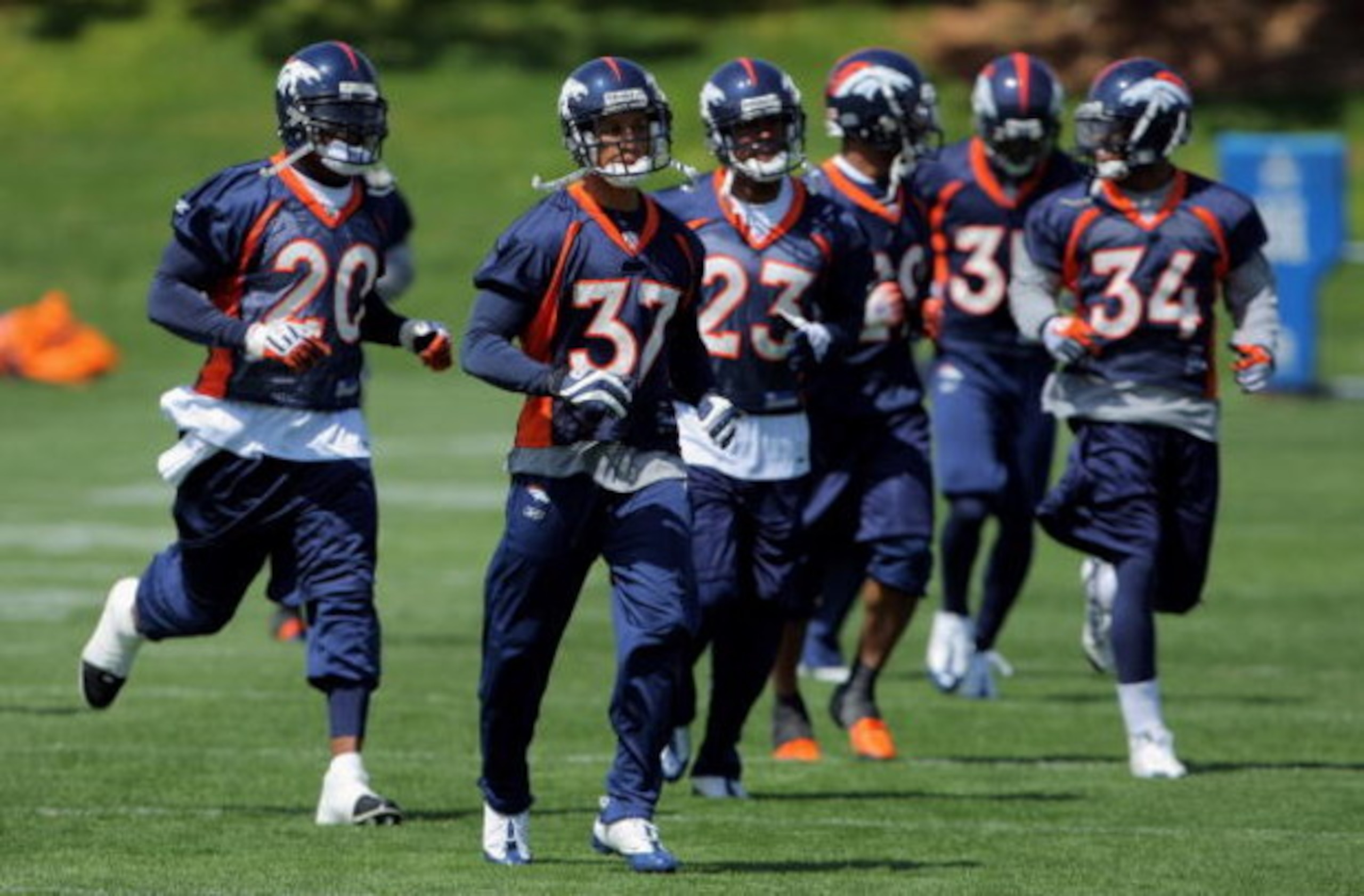 ENGLEWOOD, CO - MAY 03:  Safety Brian Dawkins #20 and the defensive backs participate in practice during Denver Broncos Minicamp at the Broncos training facility on May 3, 2009 in Englewood, Colorado.  (Photo by Doug Pensinger/Getty Images)