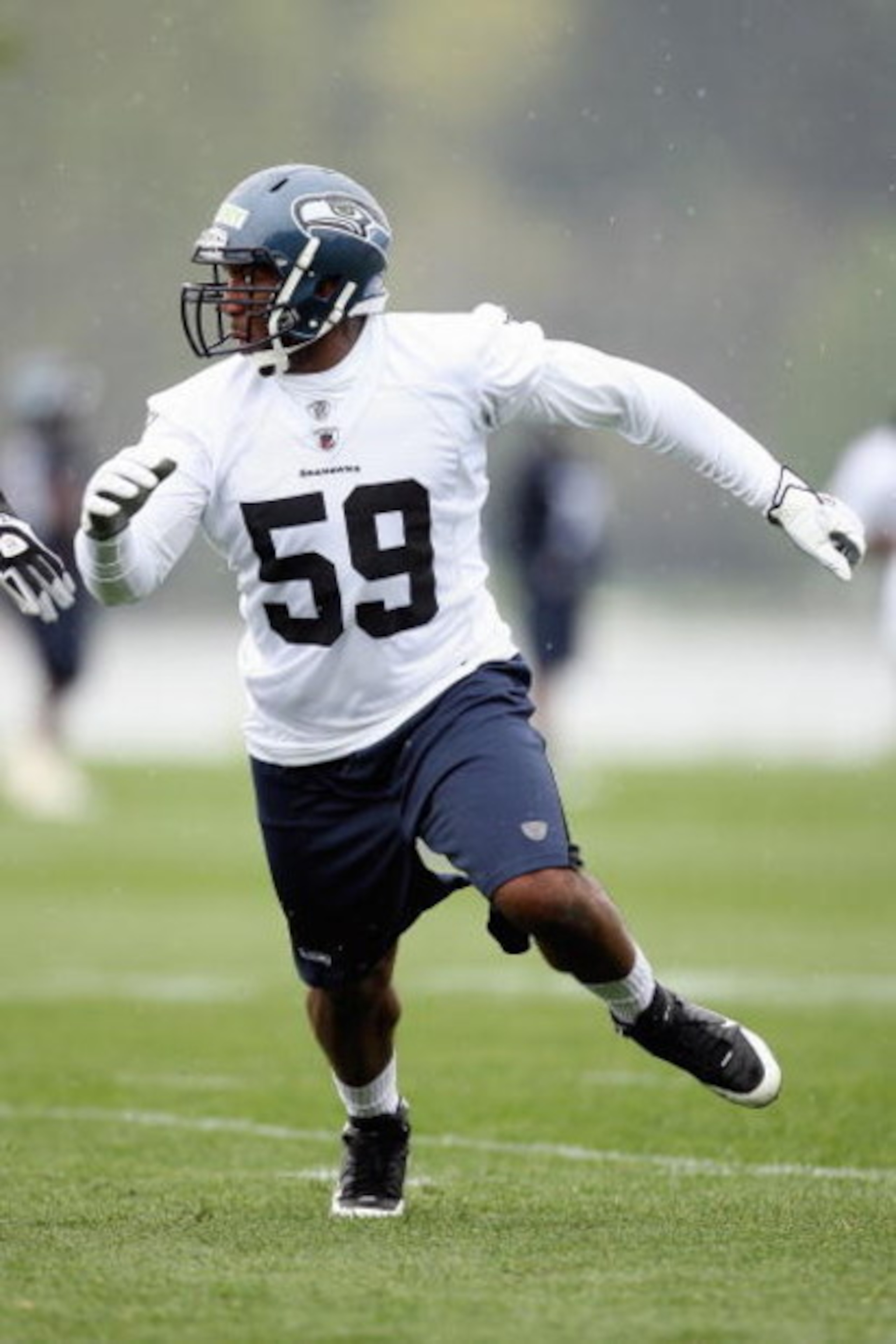 RENTON, WA - MAY 2:  Aaron Curry #59 of the Seattle Seahawks runs drills during minicamp at the Seahawks training facility on May 2, 2009 in Renton, Washington. (Photo by Otto Greule Jr/Getty Images) 