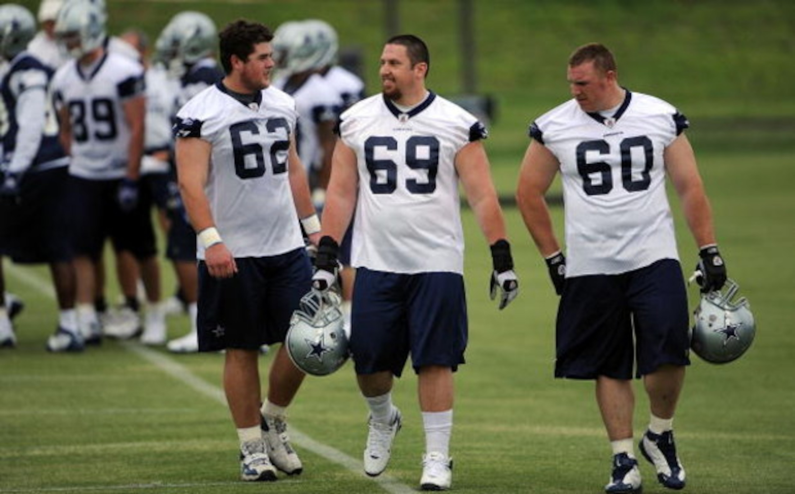 IRVING, TX - MAY 01:  (L-R)  Ryan Gibbons #62 , Matt Spanos #69 and Travis Bright #60 of the Dallas Cowboys during rookie mini camp on May 1, 2009 in Irving, Texas.  (Photo by Ronald Martinez/Getty Images)