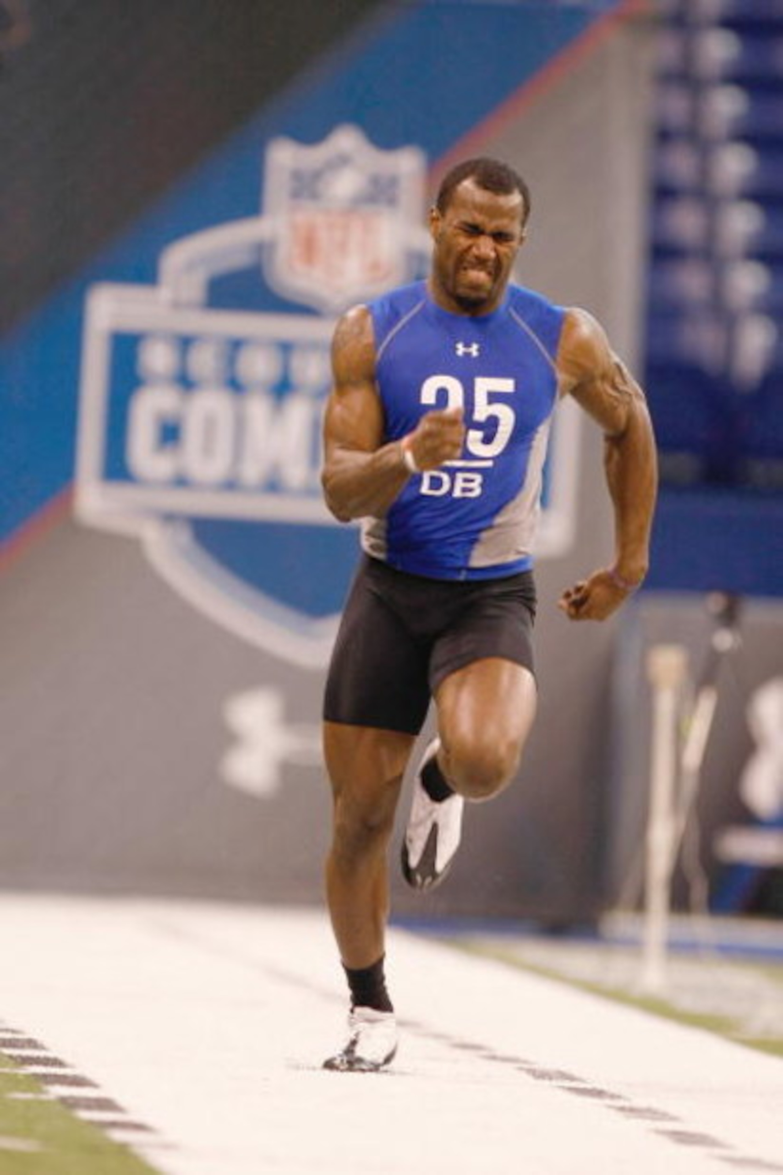 INDIANAPOLIS, IN - FEBRUARY 24:  Defensive back Malcolm Jenkins of Ohio State runs the 40 yard dash during the NFL Scouting Combine presented by Under Armour at Lucas Oil Stadium on February 24, 2009 in Indianapolis, Indiana. (Photo by Scott Boehm/Getty I