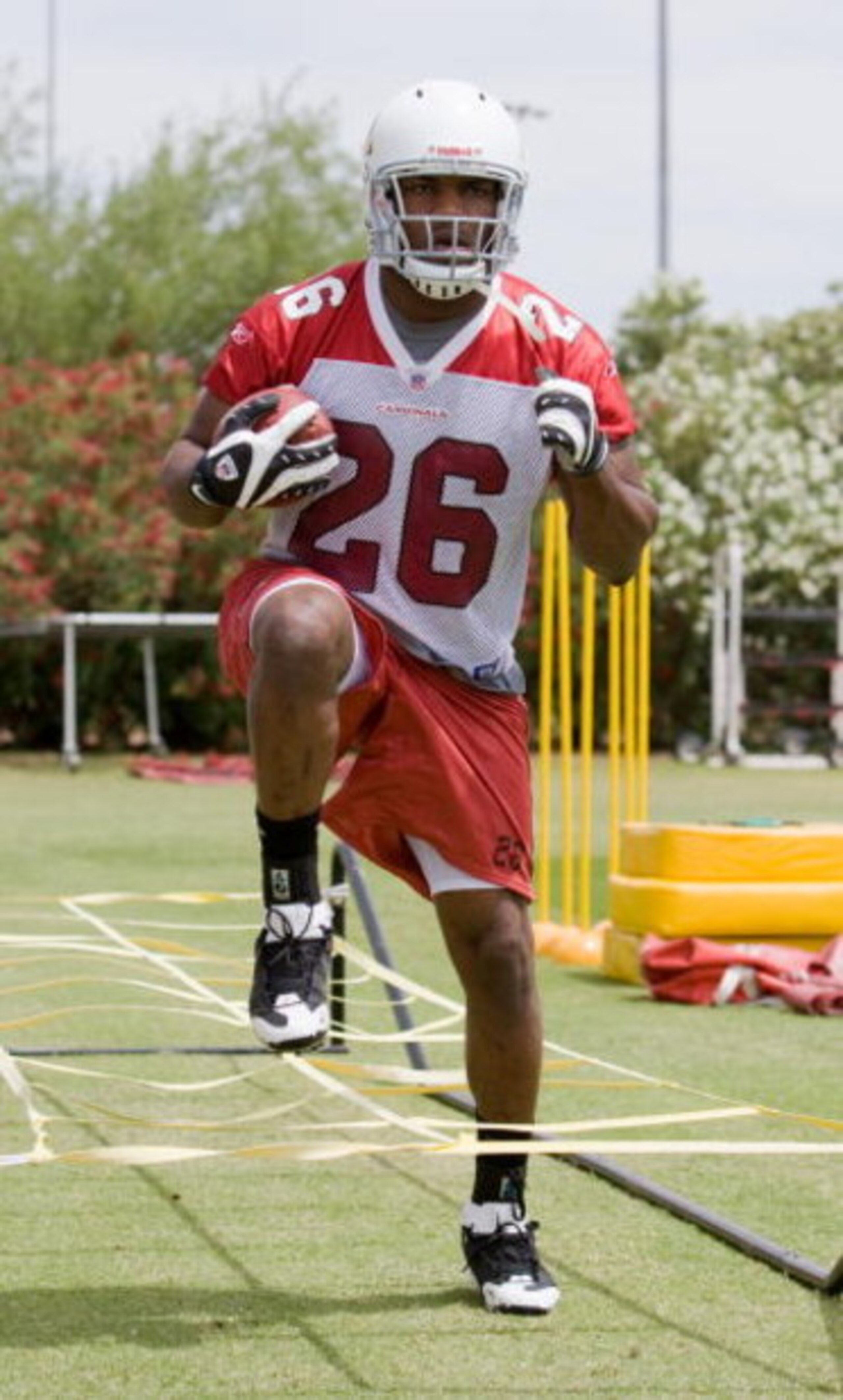TEMPE, AZ - MAY 2 :  Chris Wells #26 of the Arizona Cardinals runs drills during a team minicamp at the team training facility on May 2, 2009 in Tempe, Arizona.  (Photo by Jonathan Willey/Getty Images)