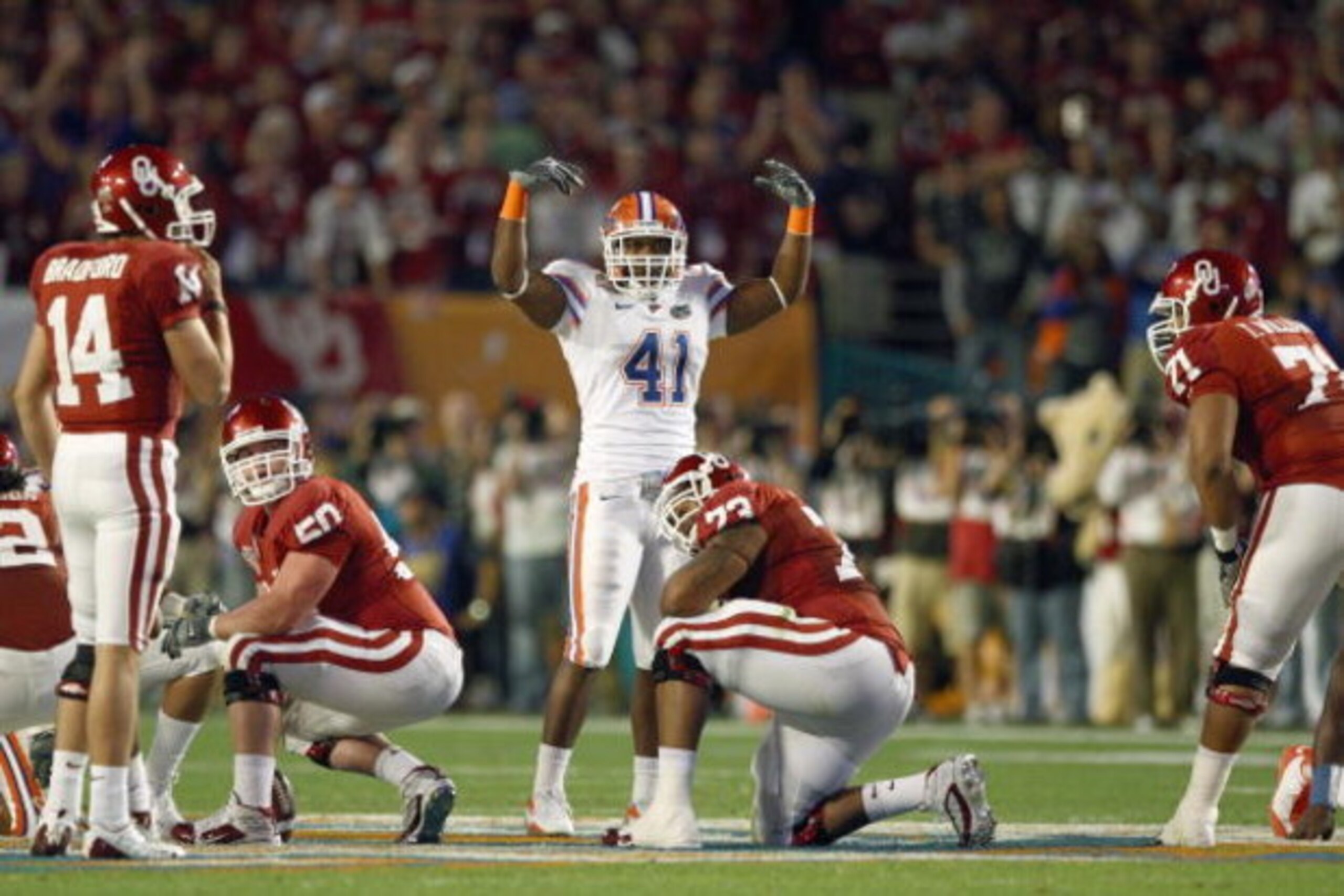 MIAMI - JANUARY 08:  Ryan Stamper #41 of the Florida Gators gets the crowd fired up during the FedEx BCS National Championship Game against the Oklahoma Sooners at Dolphin Stadium on January 8, 2009 in Miami, Florida.  (Photo by Donald Miralle/Getty Image