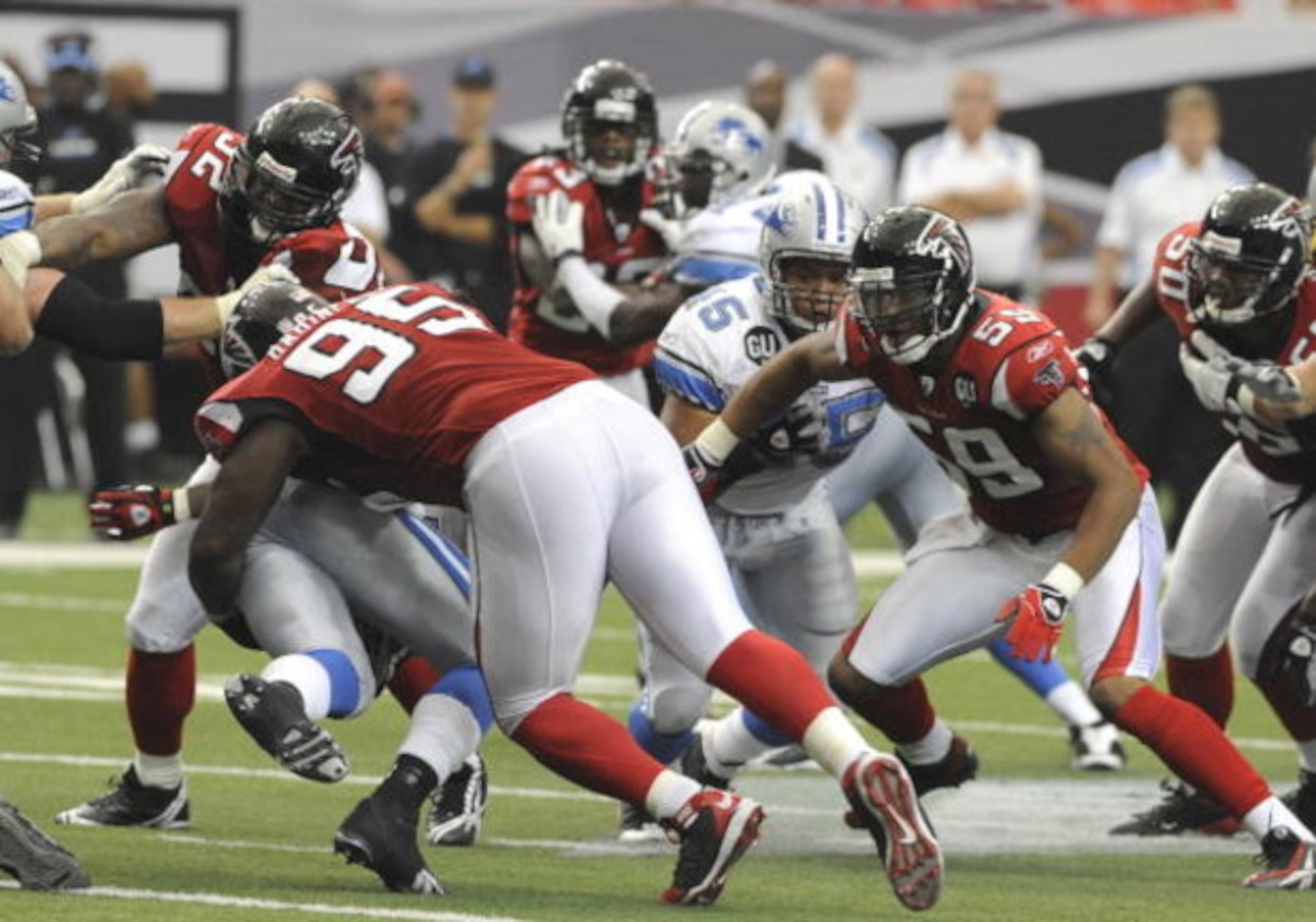 ATLANTA, GA - SEPTEMBER 7: Defensive tackle Jonathan Babineaux #95 of the Atlanta Falcons sacks quatrerback Jon Kitna #2 of the Detroit Lions at the Georgia Dome on September 7, 2008 in Atlanta, Georgia.  (Photo by Al Messerschmidt/Getty Images) 