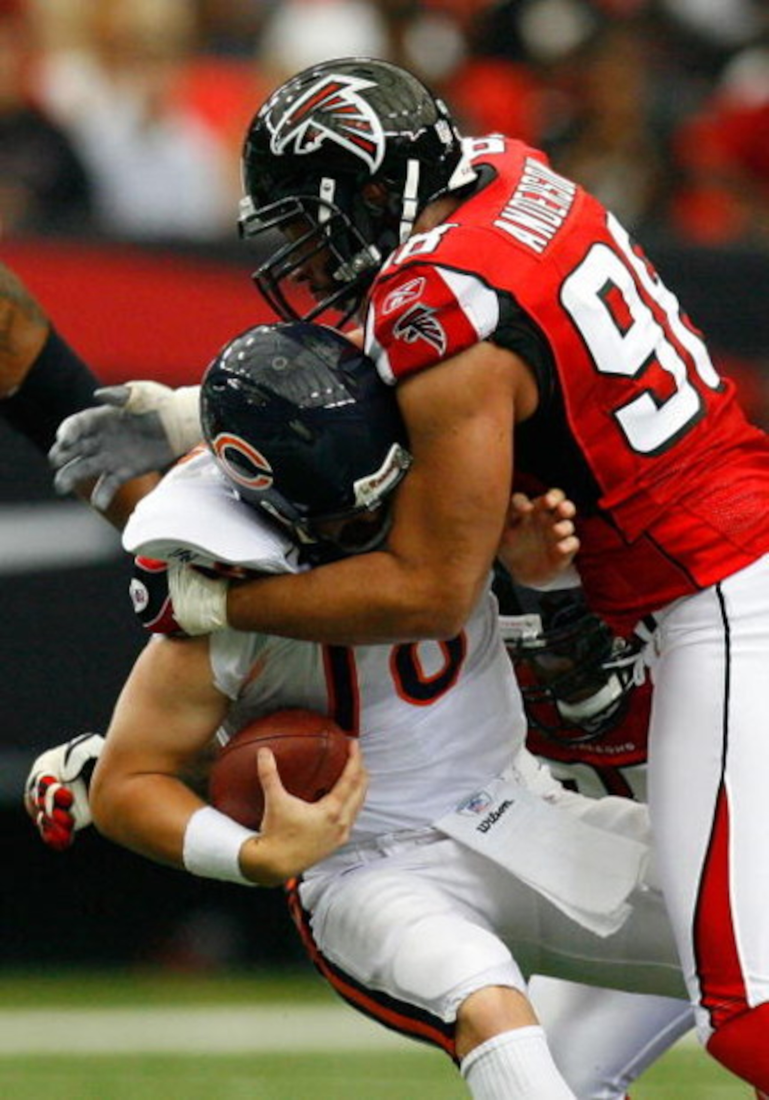 ATLANTA - OCTOBER 12:  Quarterback Kyle Orton #18 of the Chicago Bears is sacked by Jamaal Anderson #98 of the Atlanta Falcons during the game at the Georgia Dome on October 12, 2008 in Atlanta, Georgia.  (Photo by Kevin C. Cox/Getty Images)