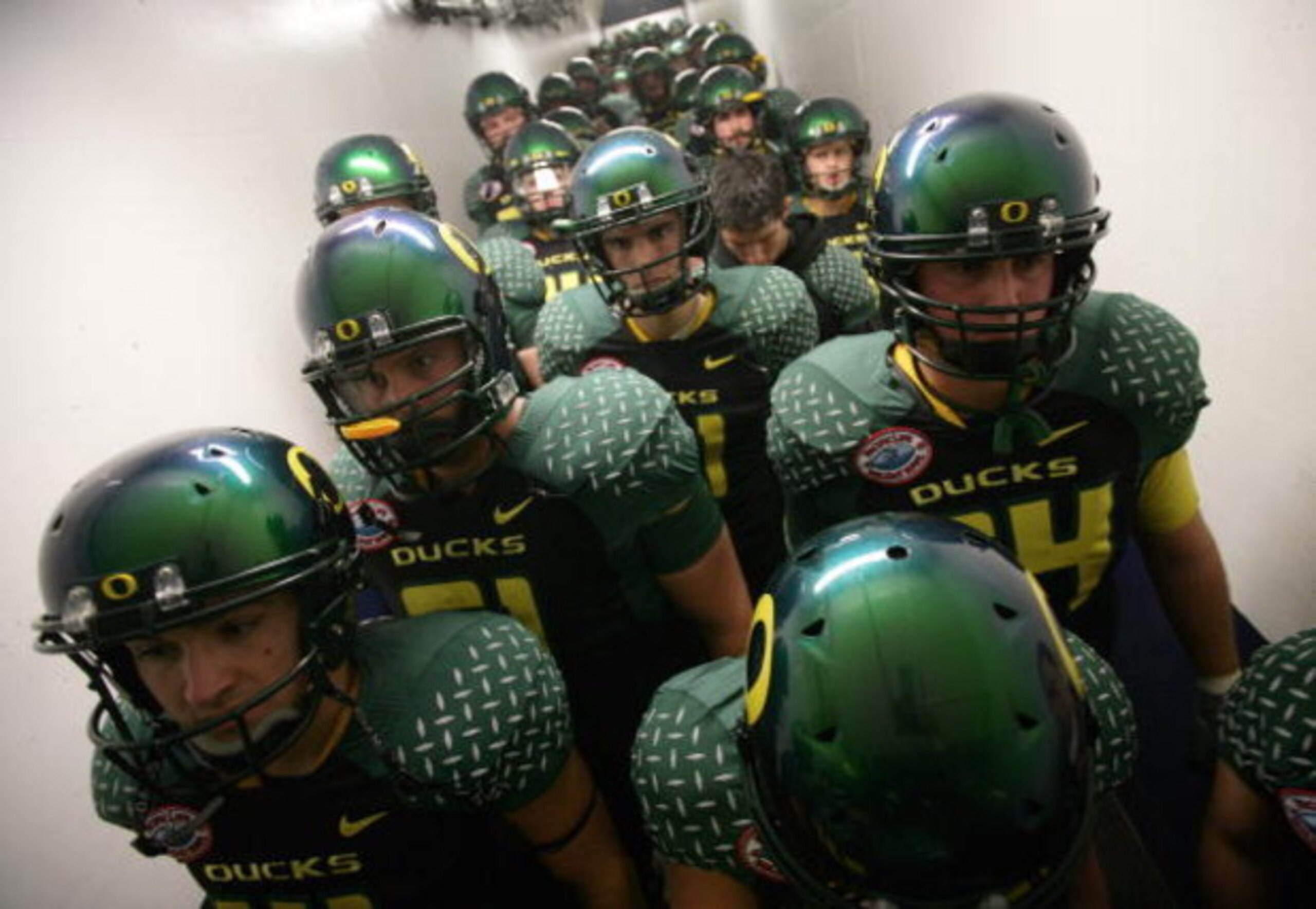 SAN DIEGO, CA - DECEMBER 30:  The University of Oregon Ducks prepare to enter the field against the Oklahoma State University Cowboys during the Pacific Life Holiday Bowl at Qualcomm Stadium on December 30, 2008 in San Diego, California. (Photo by Donald 