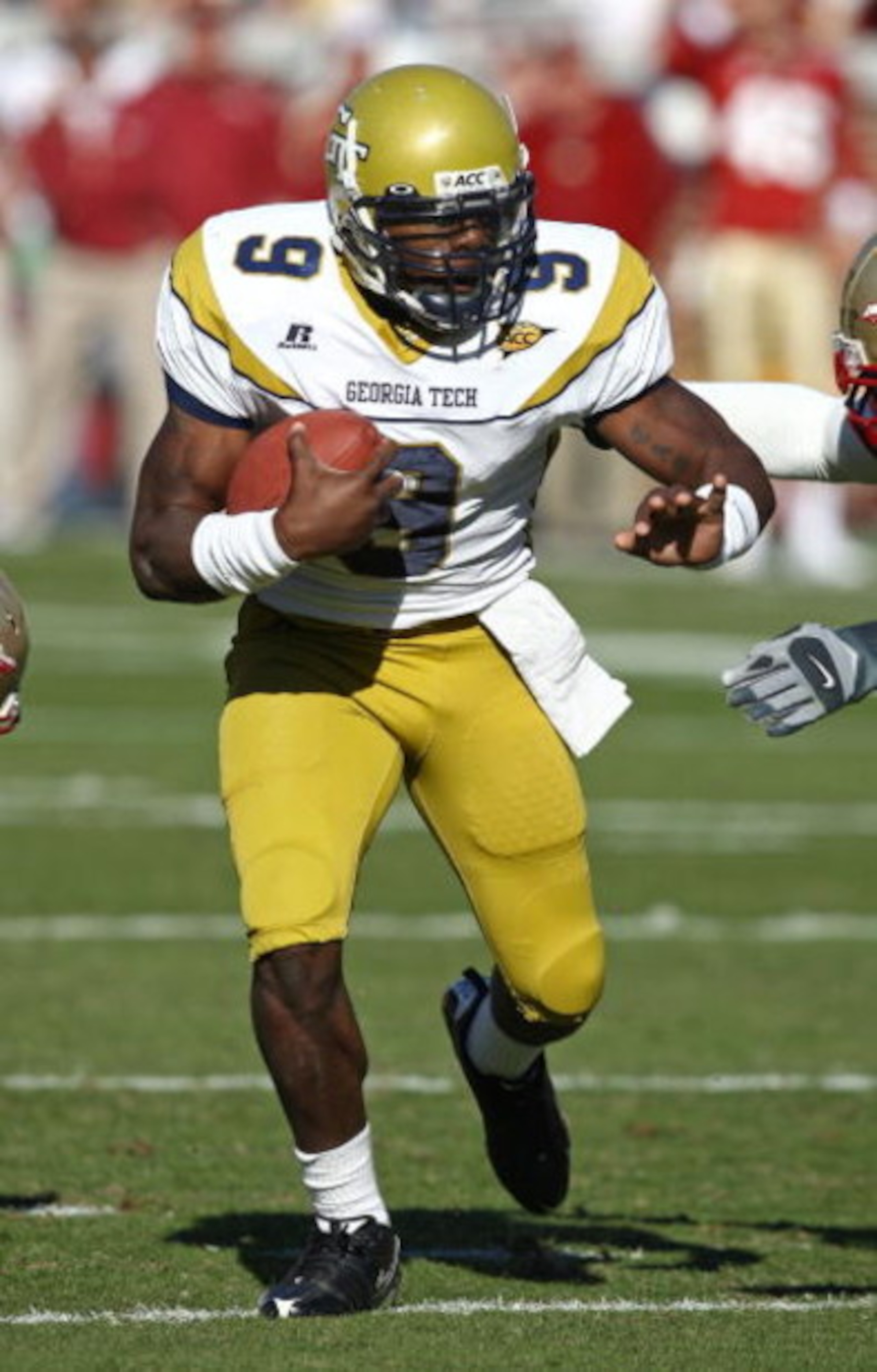 ATLANTA - NOVEMBER 1:  Quarterback Josh Nesbitt #9 of the Georgia Tech Yellow Jackets attempts to run upfield during the game against the Florida State Seminoles at Bobby Dodd Stadium at Historic Grant Field on November 1, 2008 in Atlanta, Georgia.  Georg