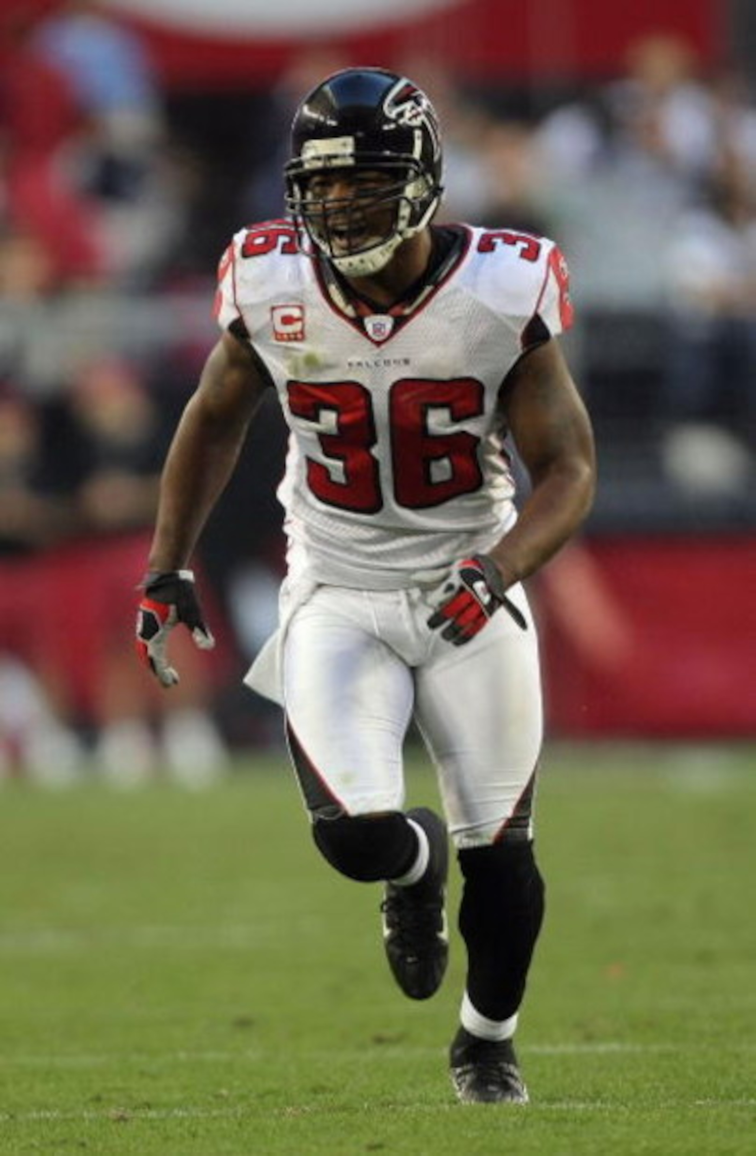 GLENDALE, AZ - DECEMBER 23:  Lawyer Milloy #36 of the Atlanta Falcons looks to make a play against the Arizona Cardinals at the University of Phoenix Stadium on December 23, 2007 in Glendale, Arizona.  The Cardinals won in overtime 30-27.  (Photo by Harry
