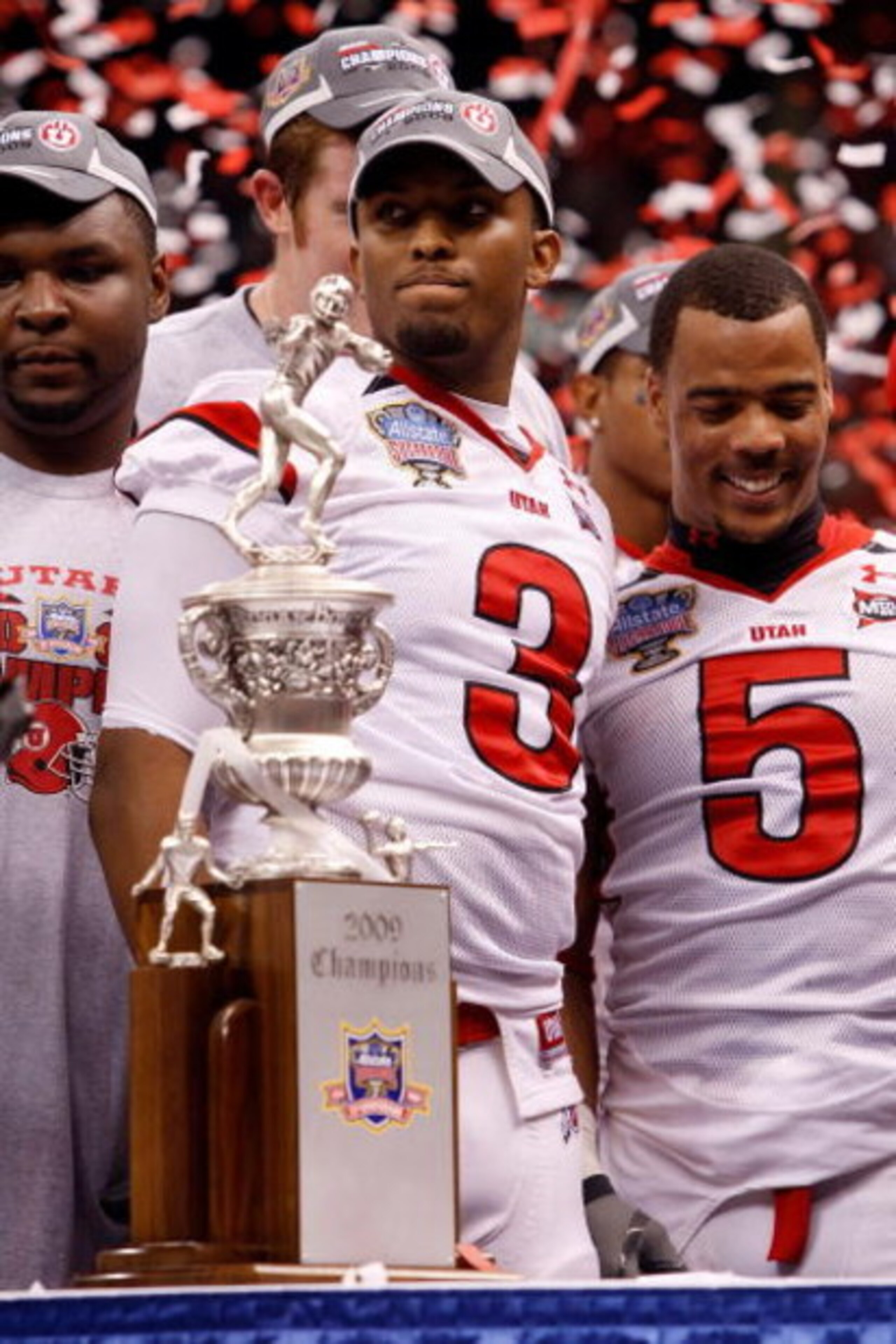 NEW ORLEANS - JANUARY 02:  (L-R) Quarterback Brian Johnson #3 and wide receiver Brent Casteel #5 of the Utah Utes celebrate after defeating the Alabama Crimson Tide 31-17 during the 75th Allstate Sugar Bowl at the Louisiana Superdome on January 2, 2009 in
