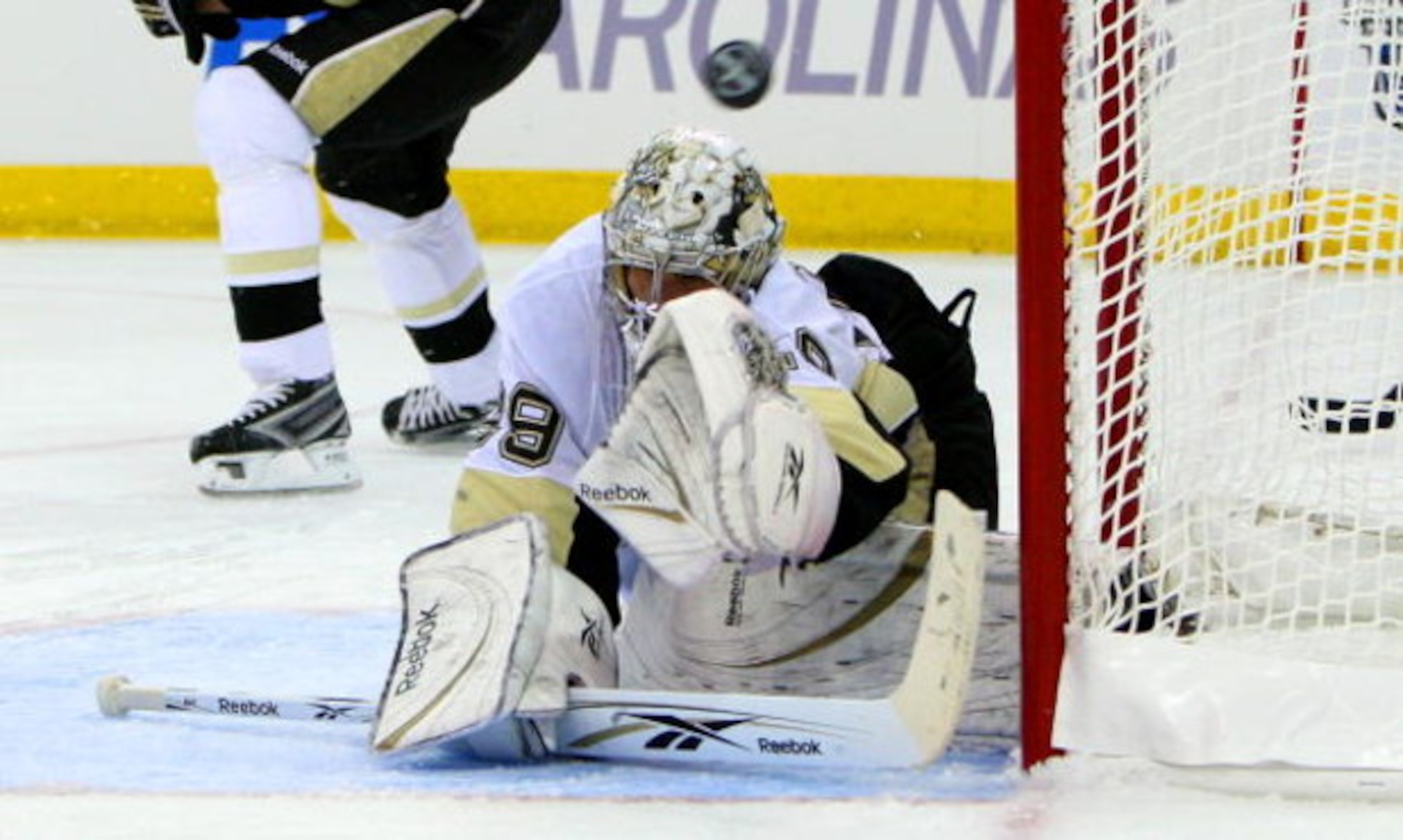 RALEIGH, NC - MAY 23:  Goaltender Marc-Andre Fleury #29 of the Pittsburgh Penguins defends against a shot by the Carolina Hurricanes during Game Three of the Eastern Conference Championship Round of the 2009 Stanley Cup Playoffs at RBC Center on May 23, 2