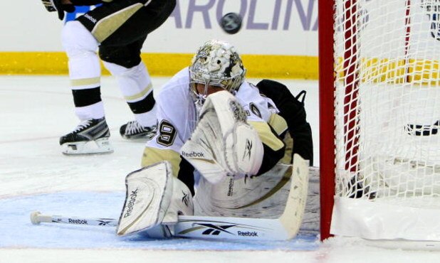 RALEIGH, NC - MAY 23:  Goaltender Marc-Andre Fleury #29 of the Pittsburgh Penguins defends against a shot by the Carolina Hurricanes during Game Three of the Eastern Conference Championship Round of the 2009 Stanley Cup Playoffs at RBC Center on May 23, 2