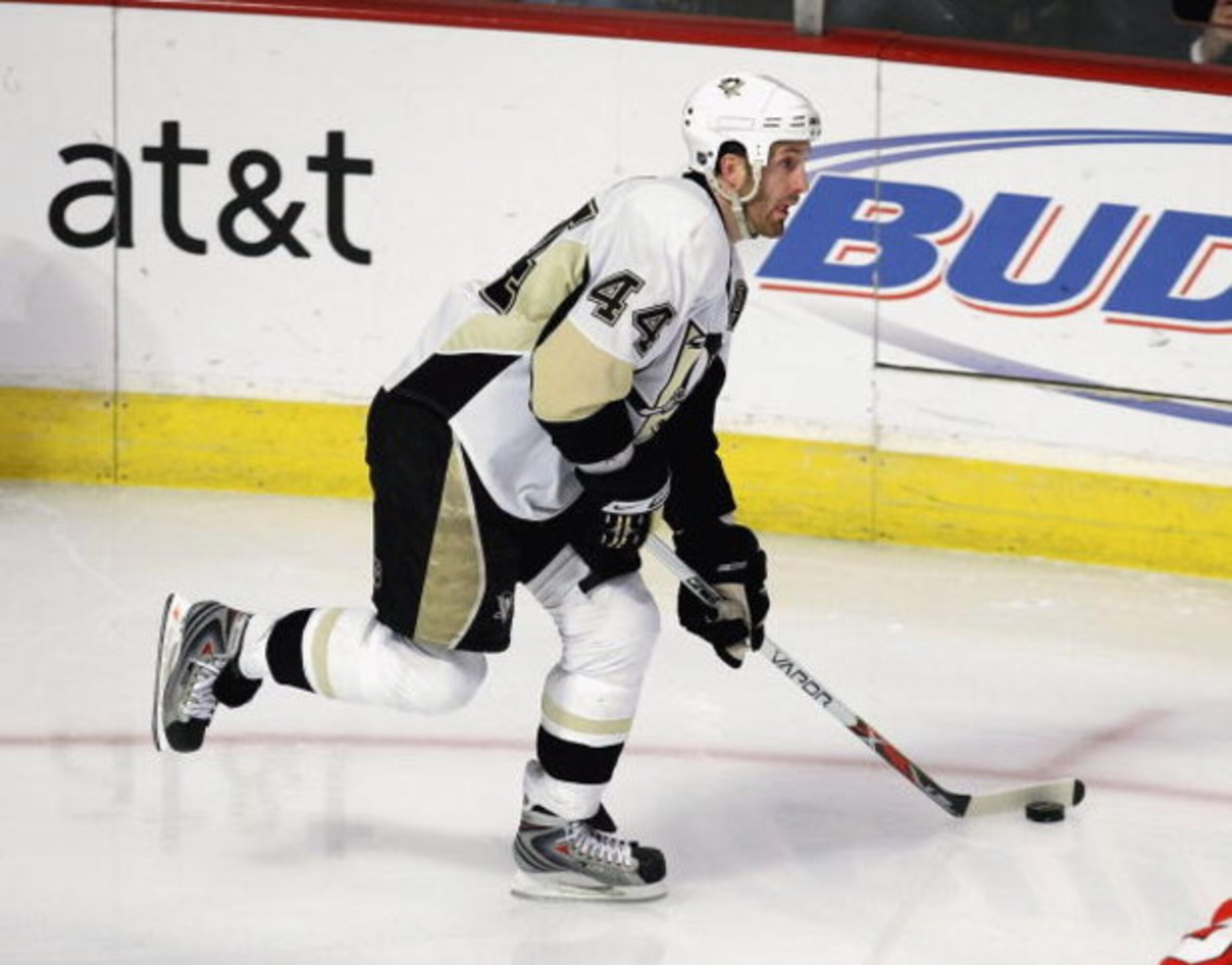 CHICAGO - FEBRUARY 27: Brooks Orpik #44 of the Pittsburgh Penguins looks to pass the puck against the Chicago Blackhawks on February 27, 2009 at the United Center in Chi cago, Illinois. The Penguins defeated the Blackhawks 5-4 in overtime. (Photo by Jonat