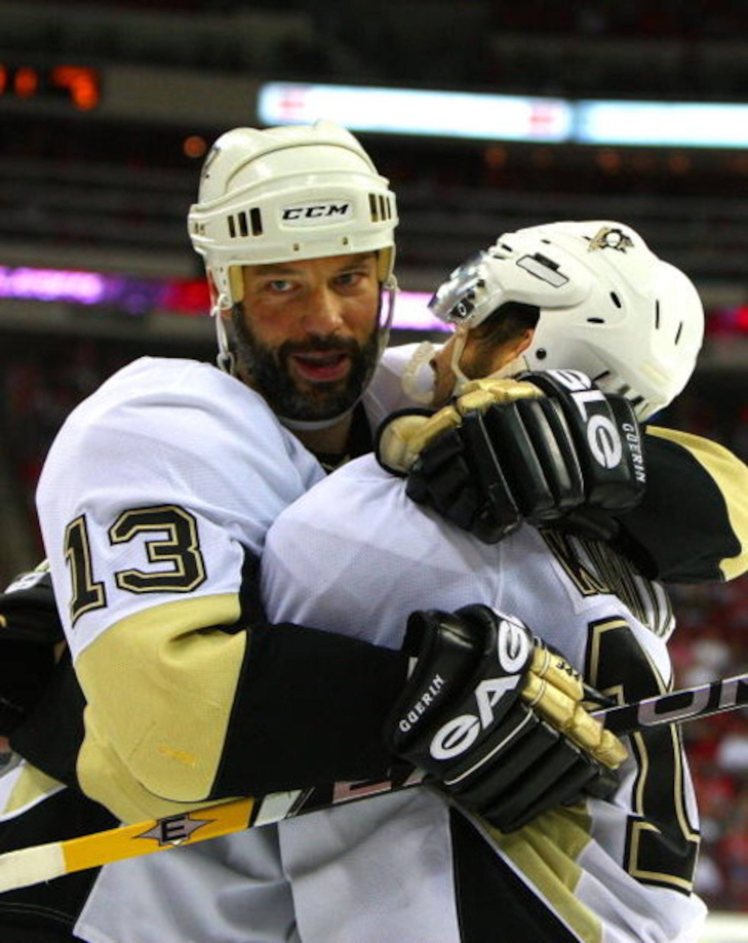 RALEIGH, NC - MAY 23:  Bill Guerin #13 of the Pittsburgh Penguins celebrates his goal with Chris Kunitz #14 against the Carolina Hurricanes during Game Three of the Eastern Conference Championship Round of the 2009 Stanley Cup Playoffs at RBC Center on Ma