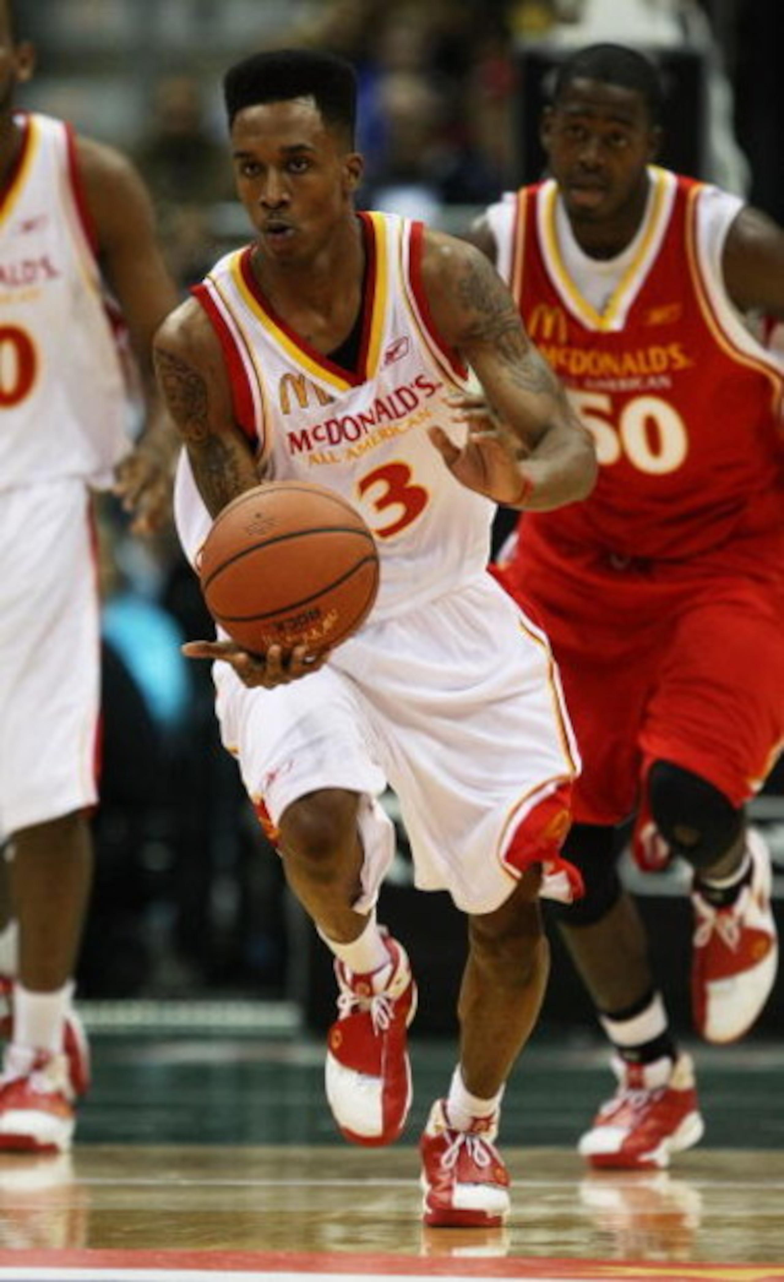 MILWAUKEE - MARCH 26: Brandon Jennings #3 of the West team brings the ball upcourt ahead of JaMychal Green #50 of the East team during the McDonald's All-American High School basketball game on March 26, 2008 at the Bradley Center in Milwaukee, Wisconsin.