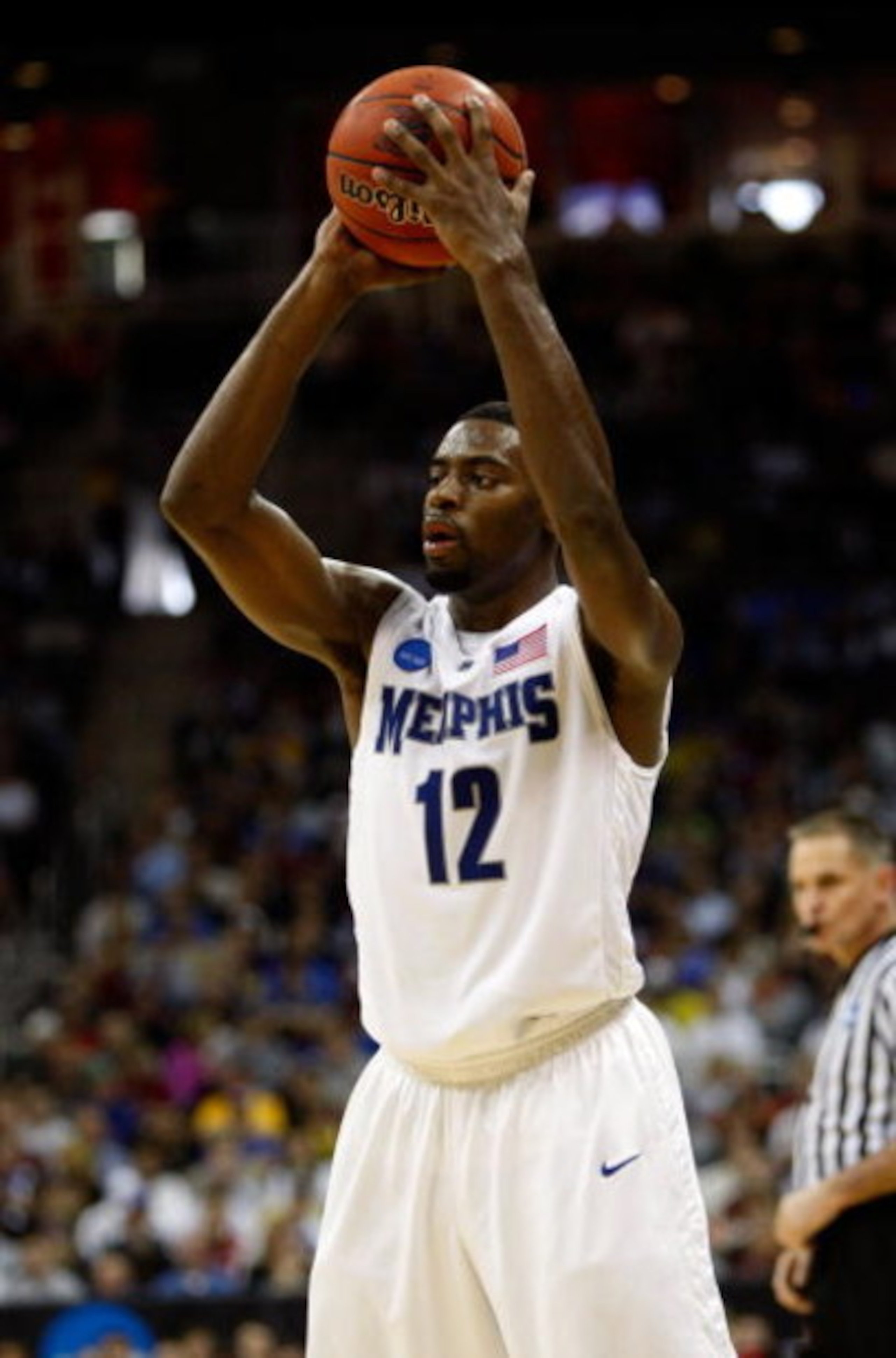 KANSAS CITY, MO - MARCH 21:  Tyreke Evans #12 of the Memphis Tigers looks to make a pass play during their second round game against the Maryland Terrapins in the NCAA Division I Men's Basketball Tournament at the Sprint Center on March 21, 2009 in Kansas