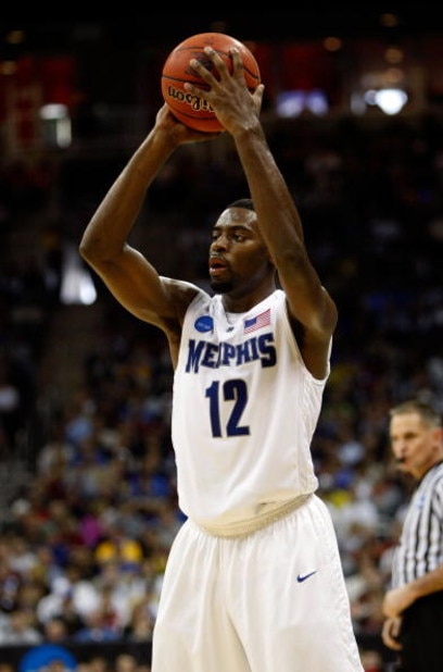 KANSAS CITY, MO - MARCH 21:  Tyreke Evans #12 of the Memphis Tigers looks to make a pass play during their second round game against the Maryland Terrapins in the NCAA Division I Men's Basketball Tournament at the Sprint Center on March 21, 2009 in Kansas